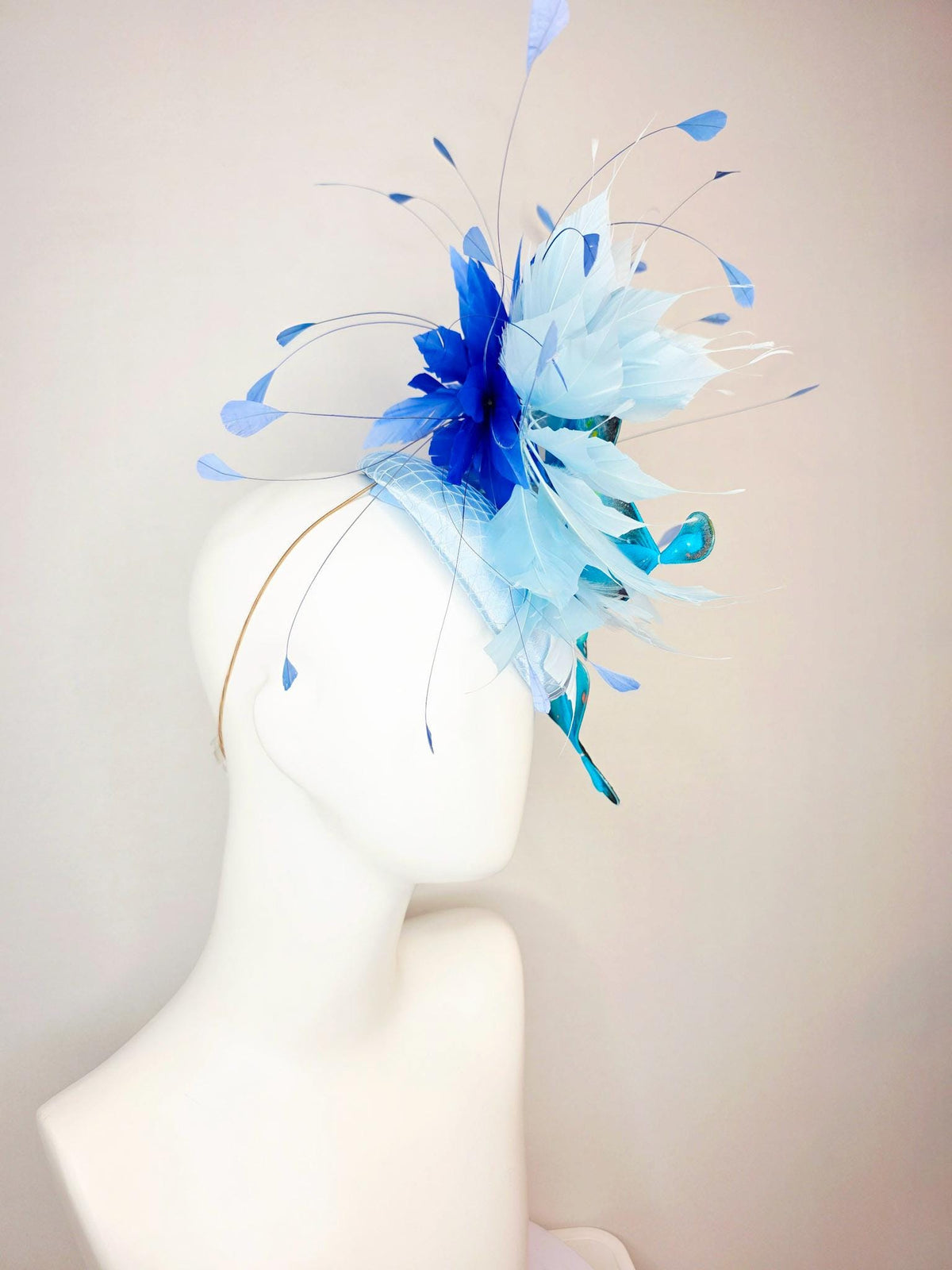 kentucky derby hat fascinator baby blue satin with netting light blue cobalt blue branching feathers large turquoise blue black butterfly