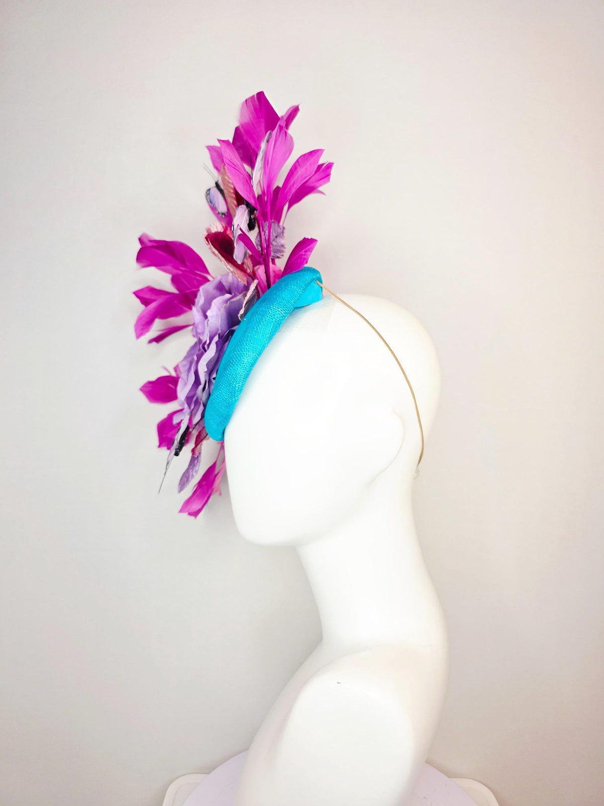 kentucky derby hat fascinator turquoise blue sinamay lavender purple satin rose ombre pink lavender leaves magenta pink feathers butterflies