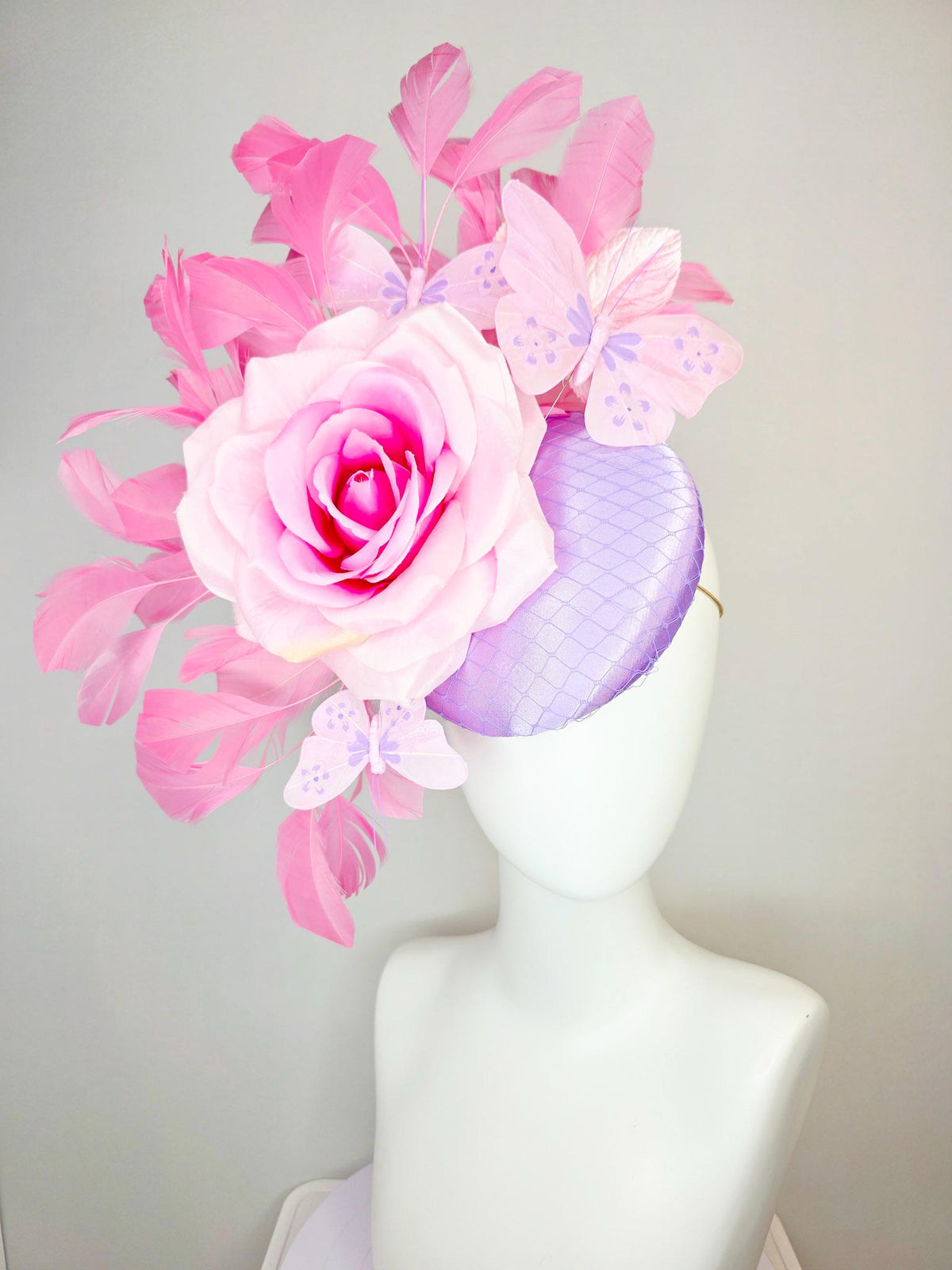 kentucky derby hat fascinator lavender purple satin with netting ombre pink satin rose light pink leaves blush pink feathers and butterflies