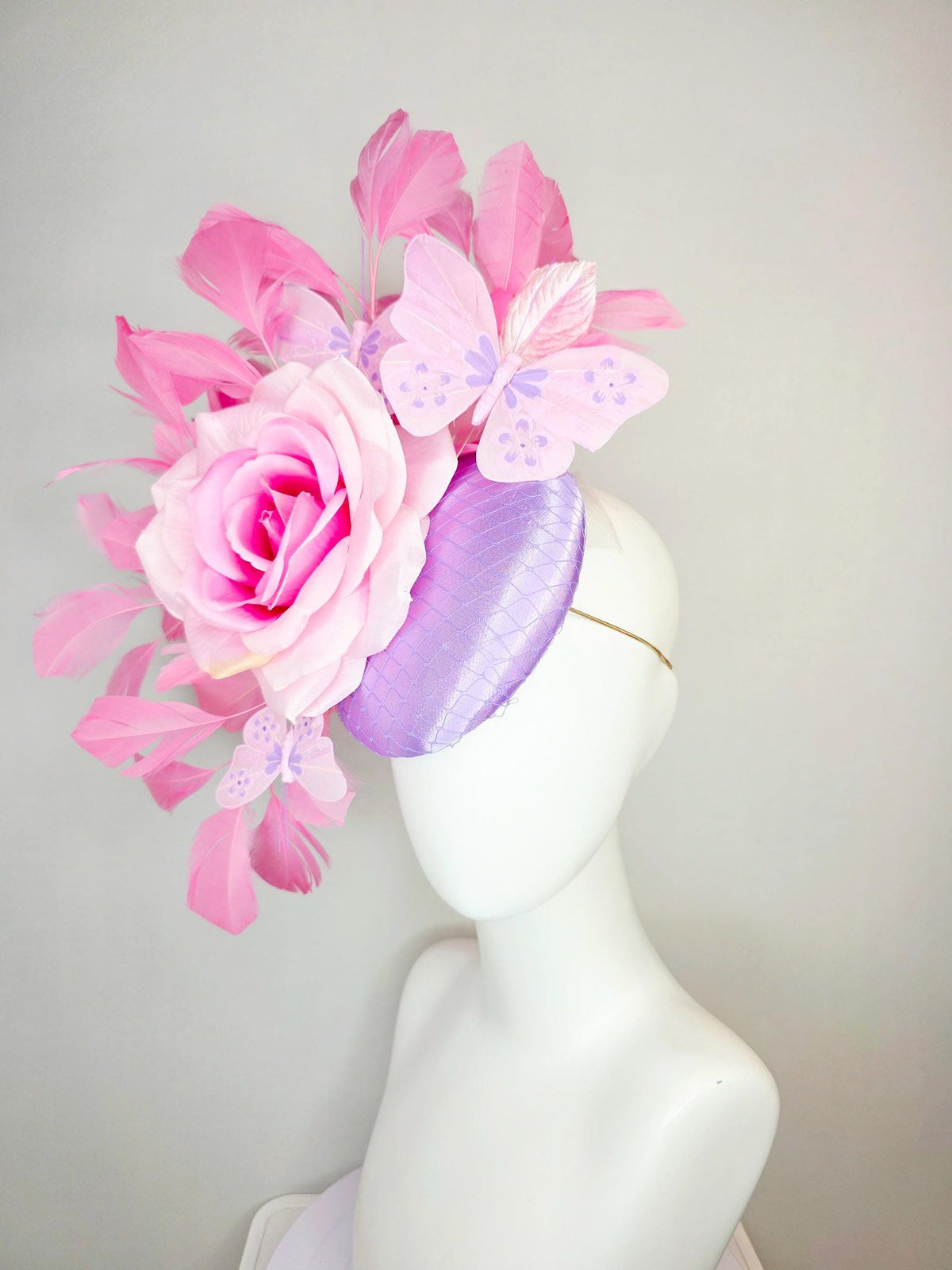 kentucky derby hat fascinator lavender purple satin with netting ombre pink satin rose light pink leaves blush pink feathers and butterflies