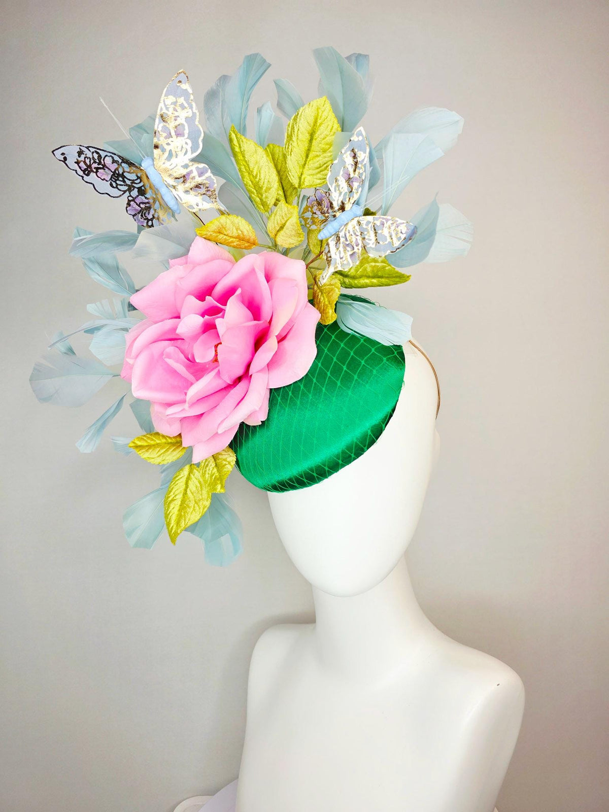 kentucky derby hat fascinator emerald green satin with netting blush pink satin rose lime yellow leaves gray blue feathers gold butterflies