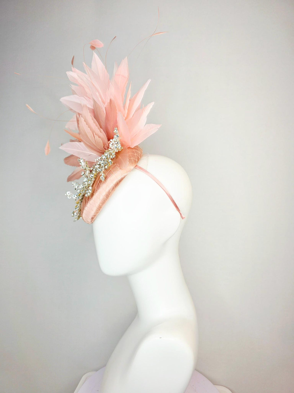 kentucky derby hat fascinator champagne pink satin with netting leaf vine clear crystal rhinestone light dusty pale mauve pink feathers