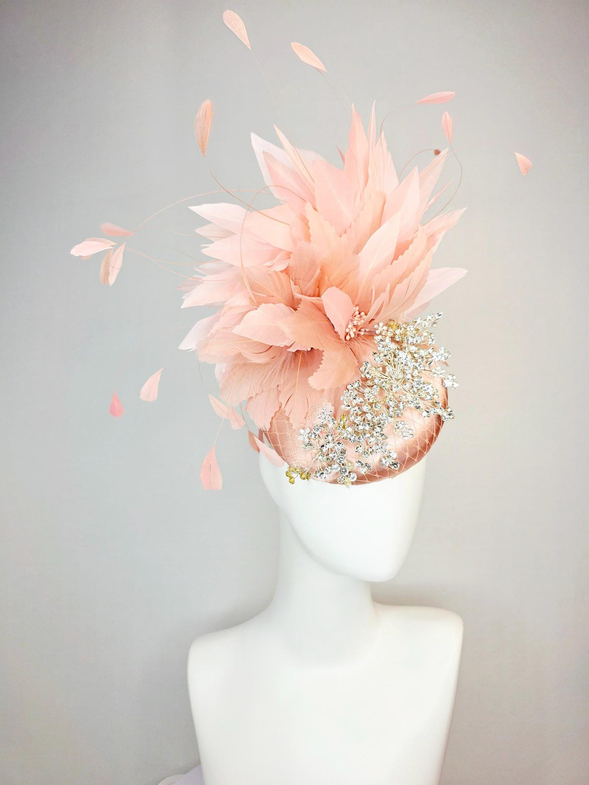 kentucky derby hat fascinator champagne pink satin with netting leaf vine clear crystal rhinestone light dusty pale mauve pink feathers
