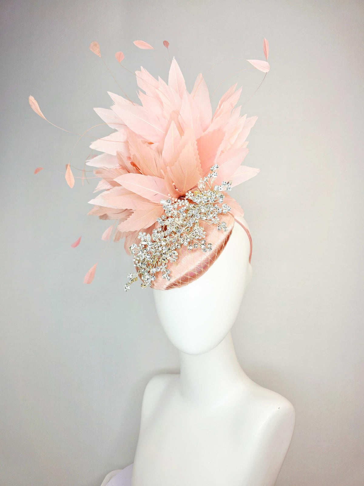 kentucky derby hat fascinator champagne pink satin with netting leaf vine clear crystal rhinestone light dusty pale mauve pink feathers