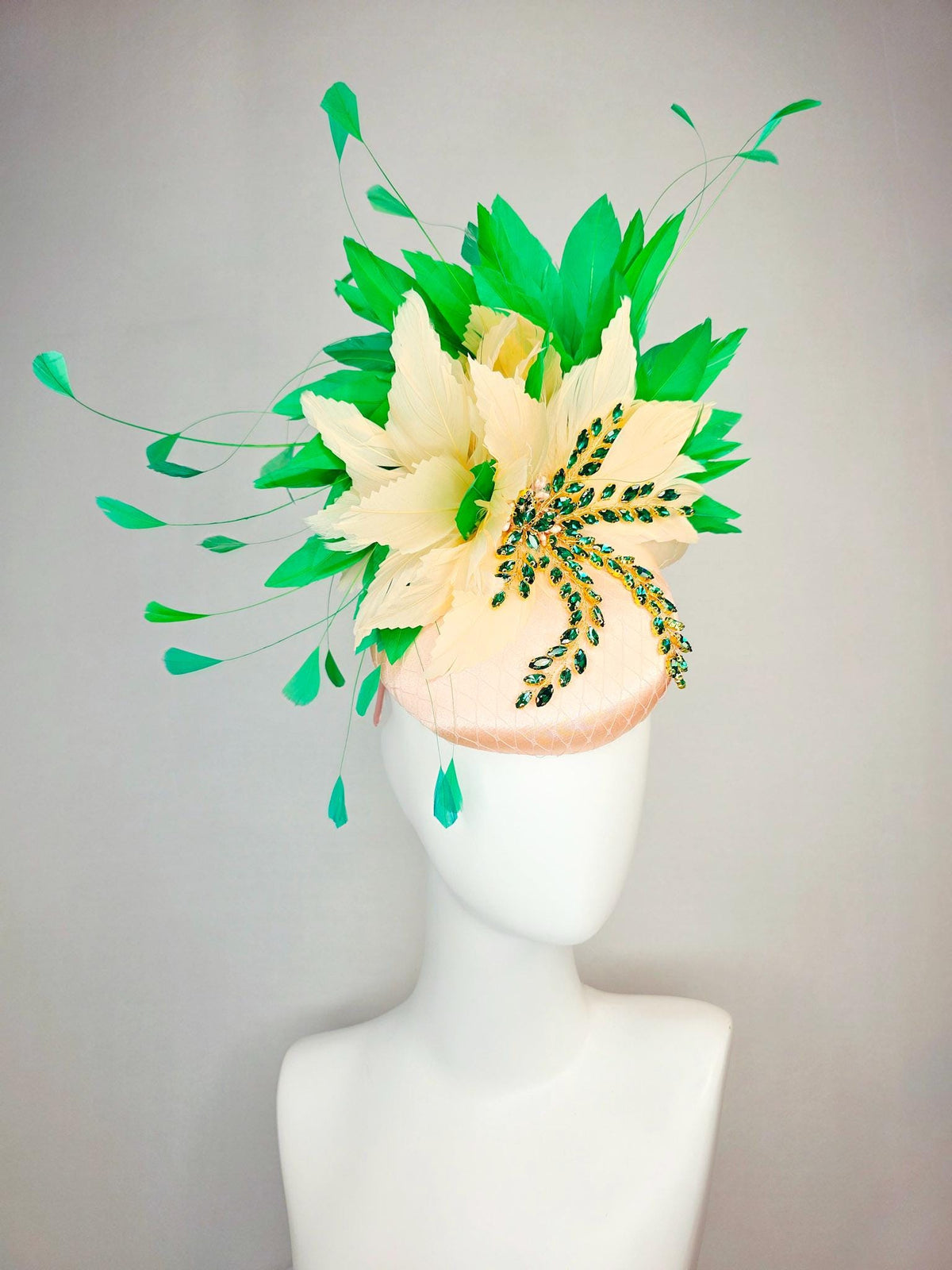 kentucky derby hat fascinator champagne pink satin with netting leaf vine emerald green crystal rhinestone cream beige bright green feathers