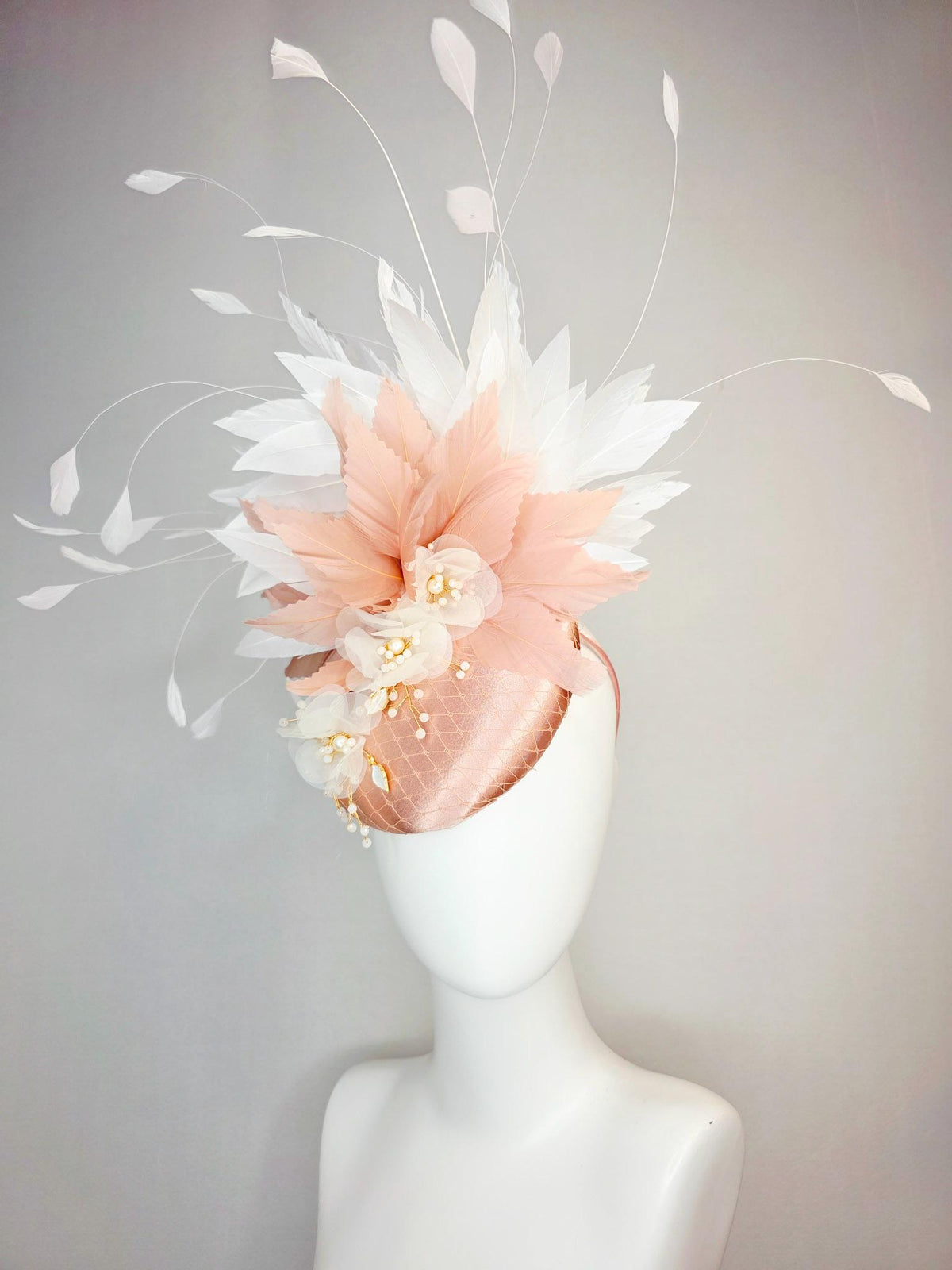 kentucky derby hat fascinator champagne pink satin with netting white organza flowers pearl strings dusty pink and white branching feathers