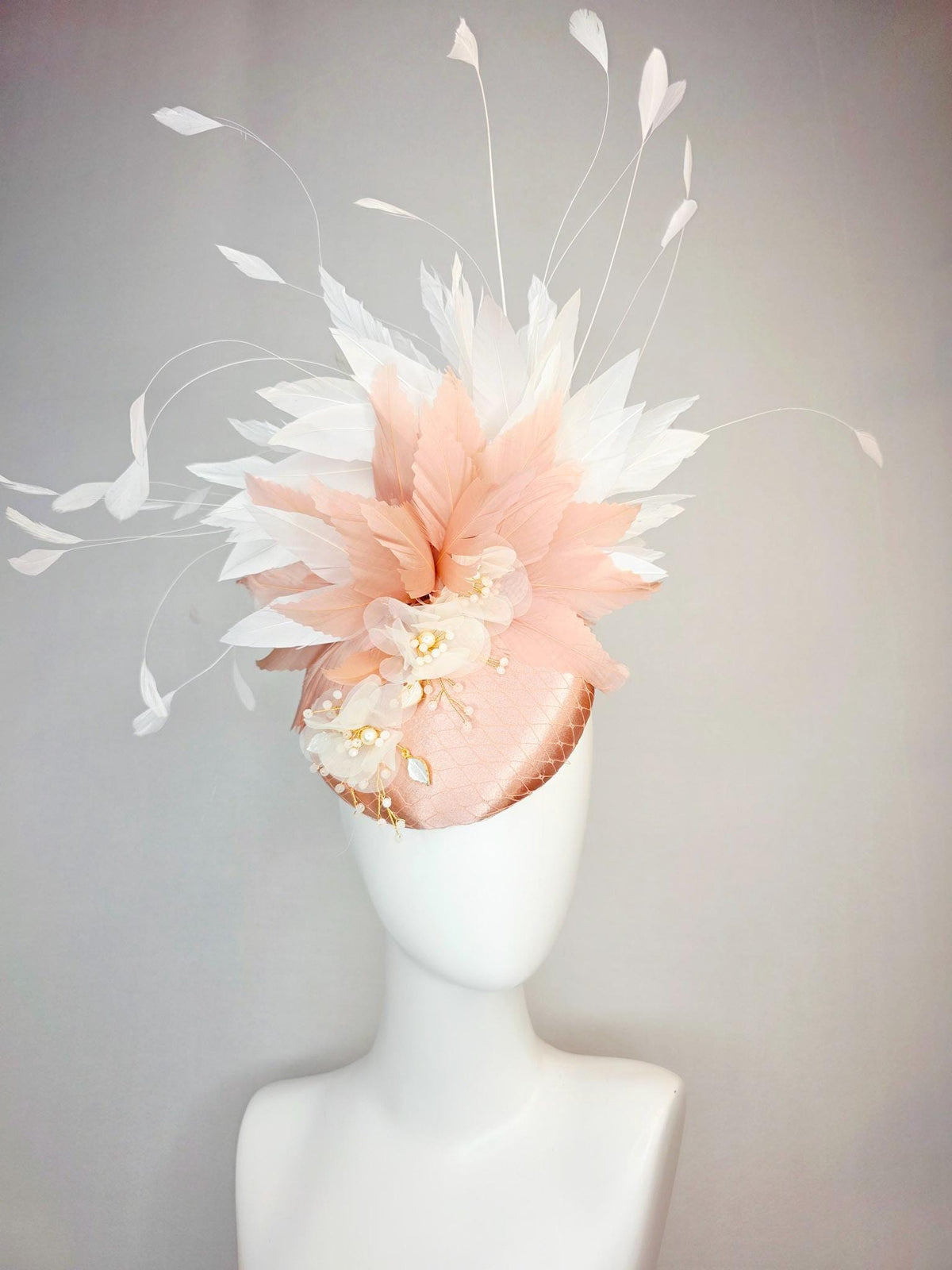 kentucky derby hat fascinator champagne pink satin with netting white organza flowers pearl strings dusty pink and white branching feathers