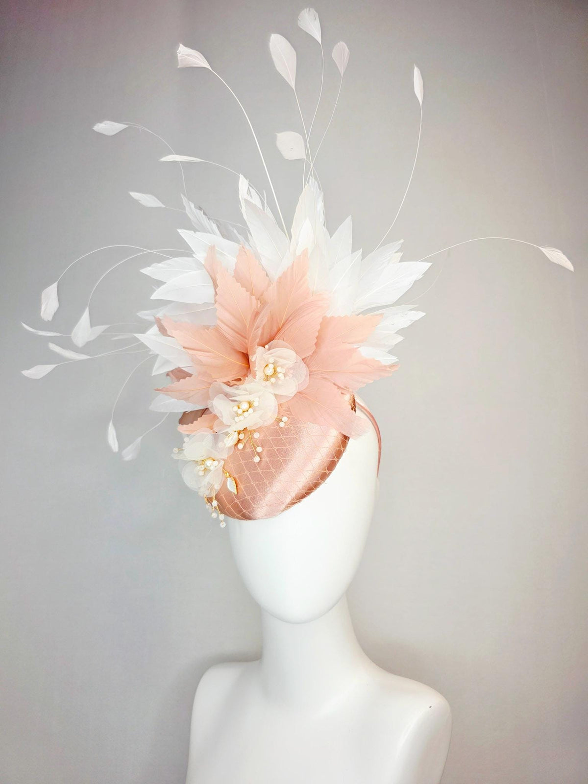 kentucky derby hat fascinator champagne pink satin with netting white organza flowers pearl strings dusty pink and white branching feathers