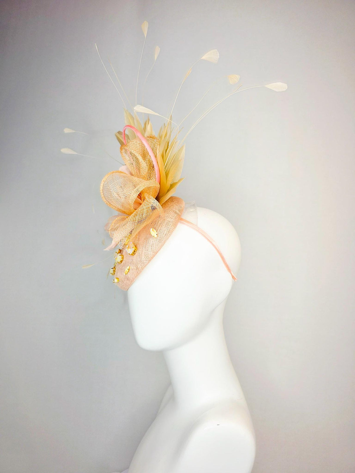 kentucky derby hat fascinator champagne pink sinamay with iridescent beige crystal rhinestone jewels light peach flower tan beige feathers