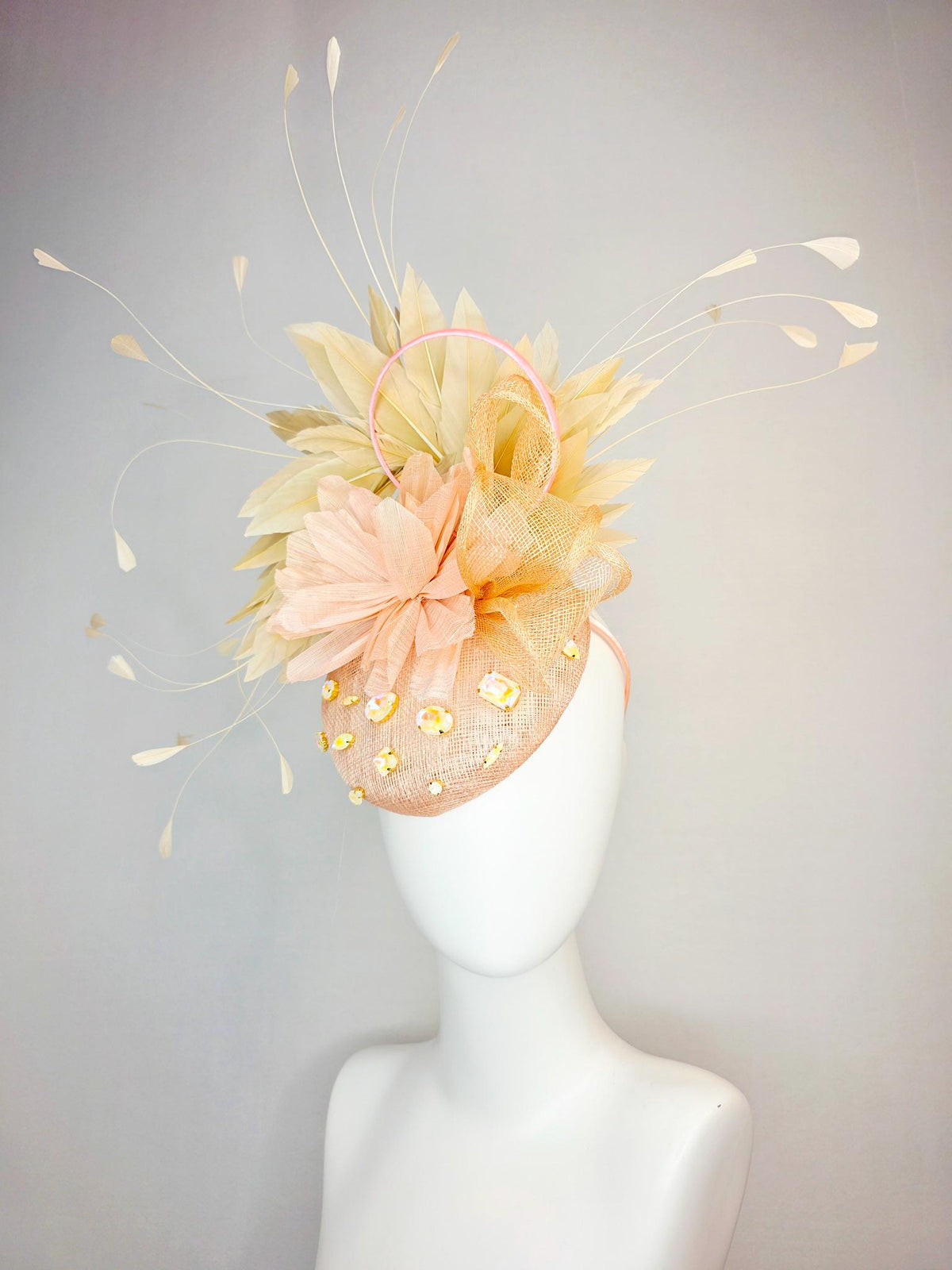 kentucky derby hat fascinator champagne pink sinamay with iridescent beige crystal rhinestone jewels light peach flower tan beige feathers