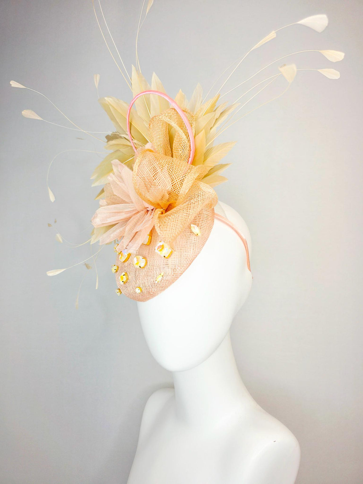 kentucky derby hat fascinator champagne pink sinamay with iridescent beige crystal rhinestone jewels light peach flower tan beige feathers