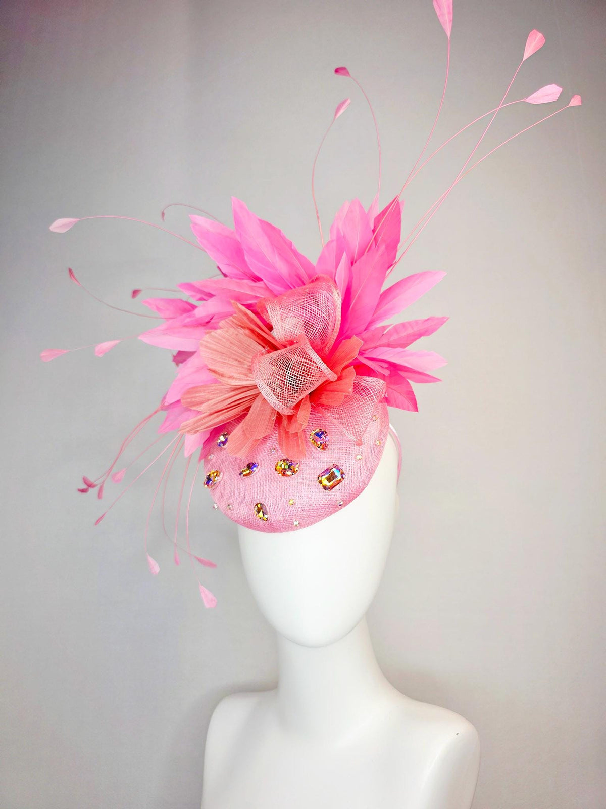 kentucky derby hat fascinator light pink sinamay iridescent pink crystal rhinestone jewels light pink bow peach orange blush pink feathers