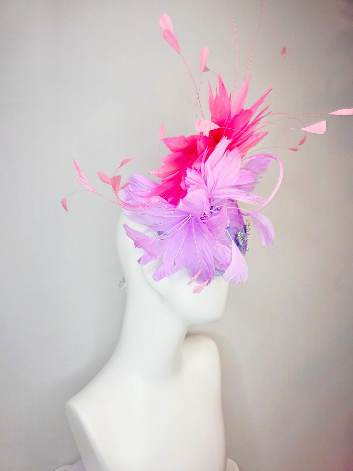 kentucky derby hat fascinator lavender purple satin with netting iridescent crystal rhinestone jewels lilac purple and pink fluffy feathers