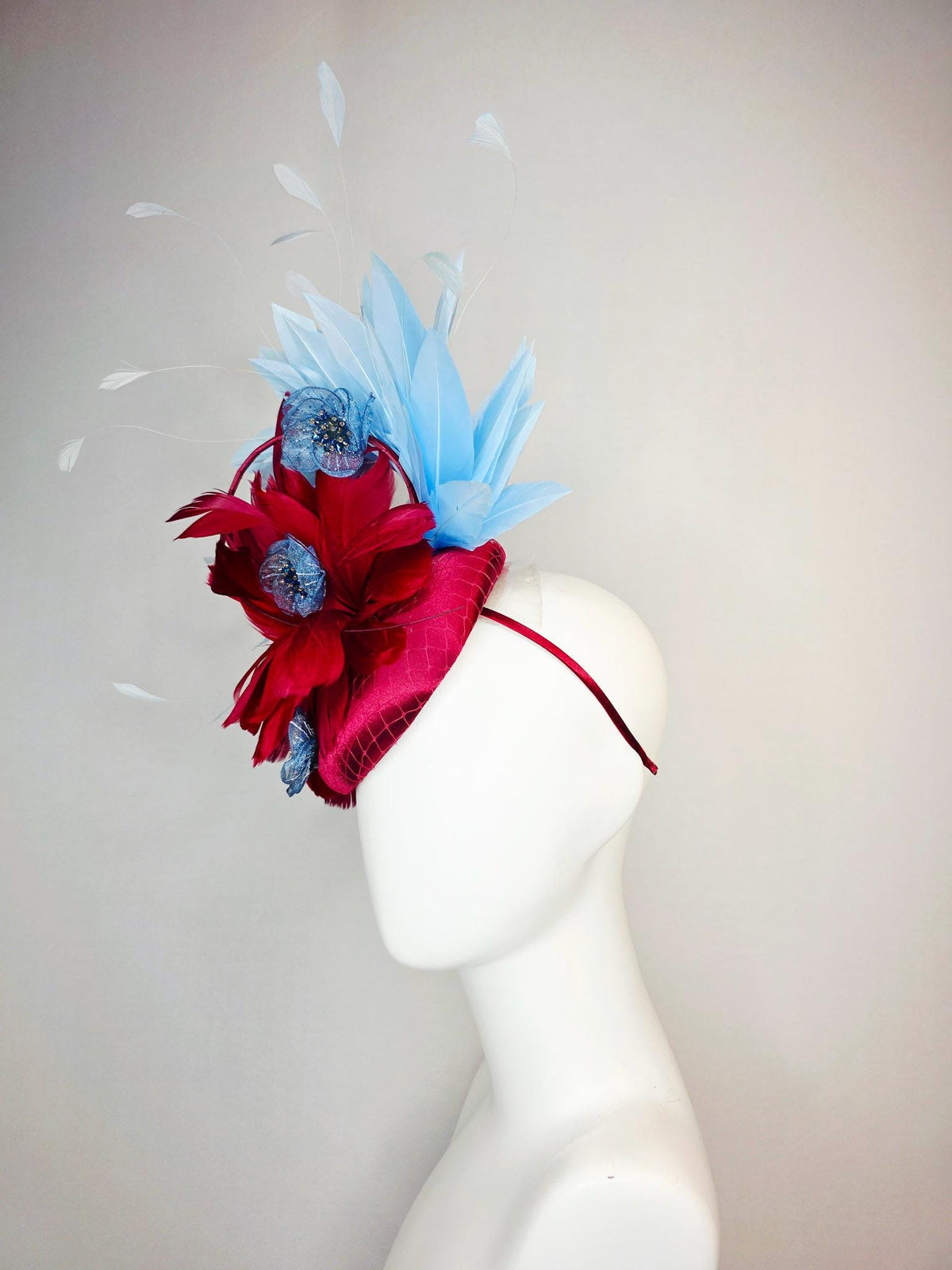 kentucky derby hat fascinator wine red satin with netting scarlet red sky blue branching feathers blue organza flowers rhinestone center