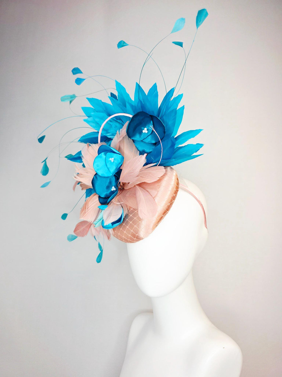 kentucky derby hat fascinator champagne beige satin with netting light dusty pink sky ocean blue feathers peacock turquoise satin flowers