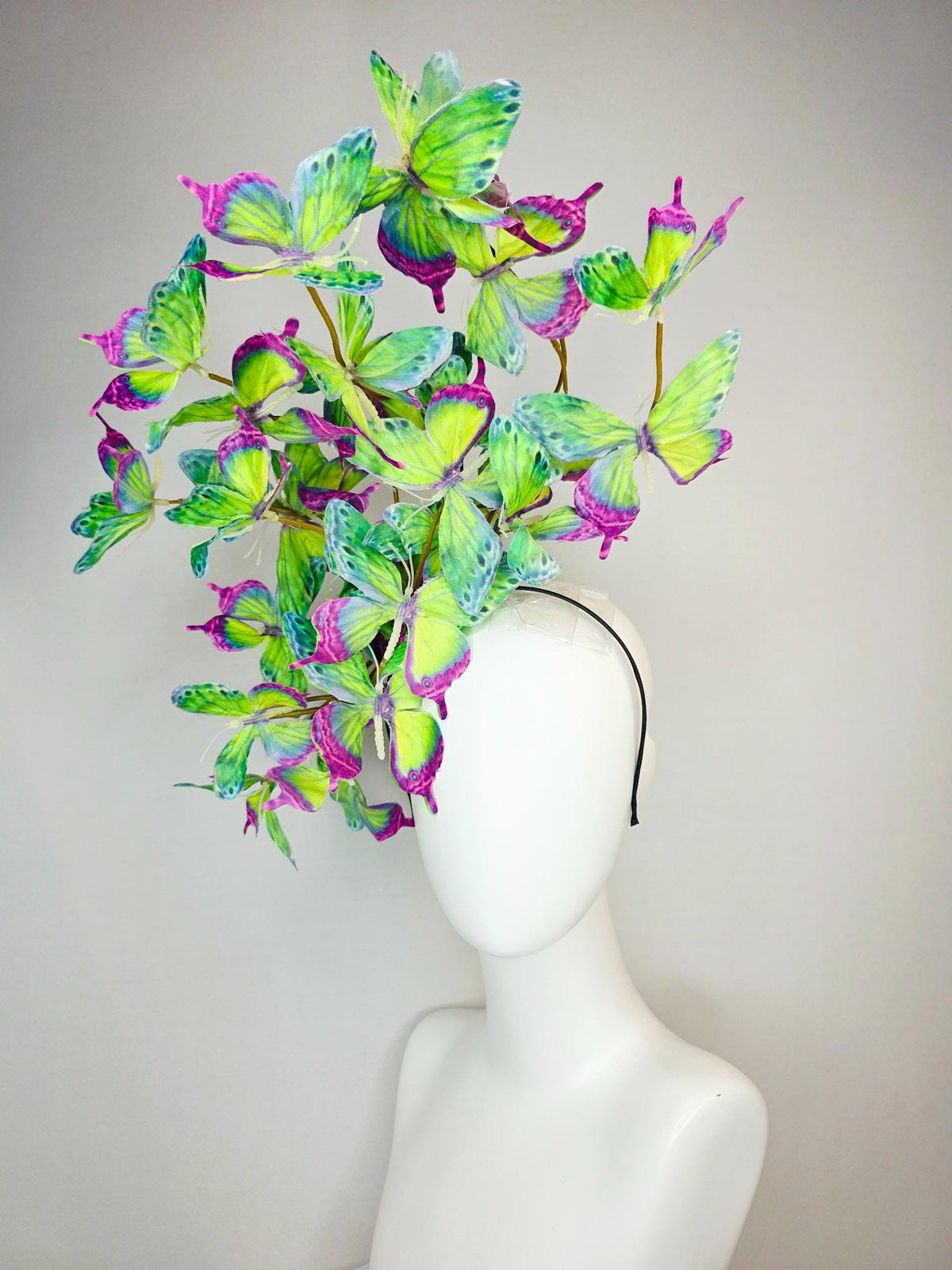 kentucky derby hat fascinator large branching colorful magenta pink purple lime green yellow blue fabric butterflies on headband