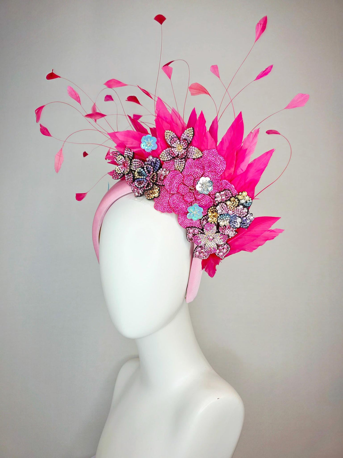 kentucky derby hat fascinator light pink satin headband with light hot pink purple blue gold crystal flowers and hot fuchsia pink feathers