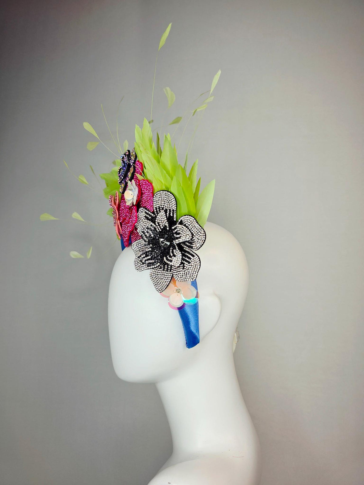 kentucky derby hat fascinator cobalt blue satin headband with silver black pink iridescent pink purple crystal flowers lime green feathers