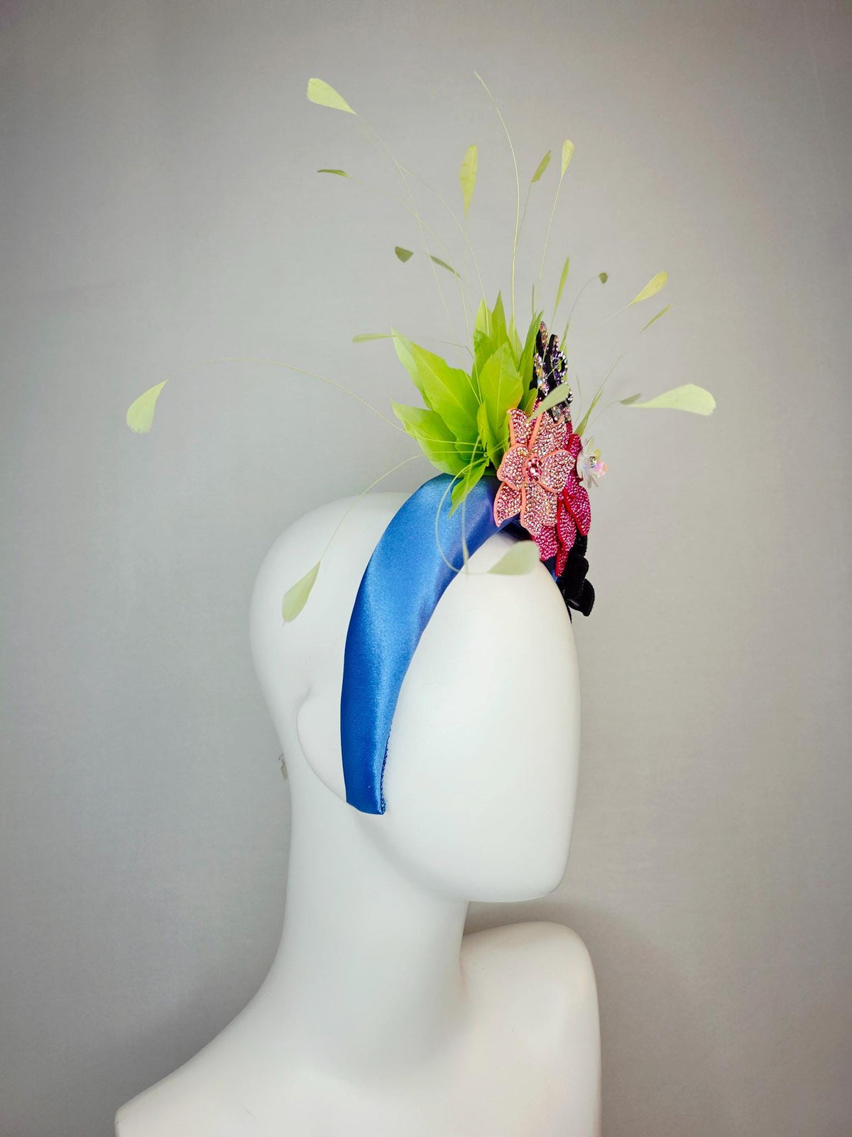 kentucky derby hat fascinator cobalt blue satin headband with silver black pink iridescent pink purple crystal flowers lime green feathers