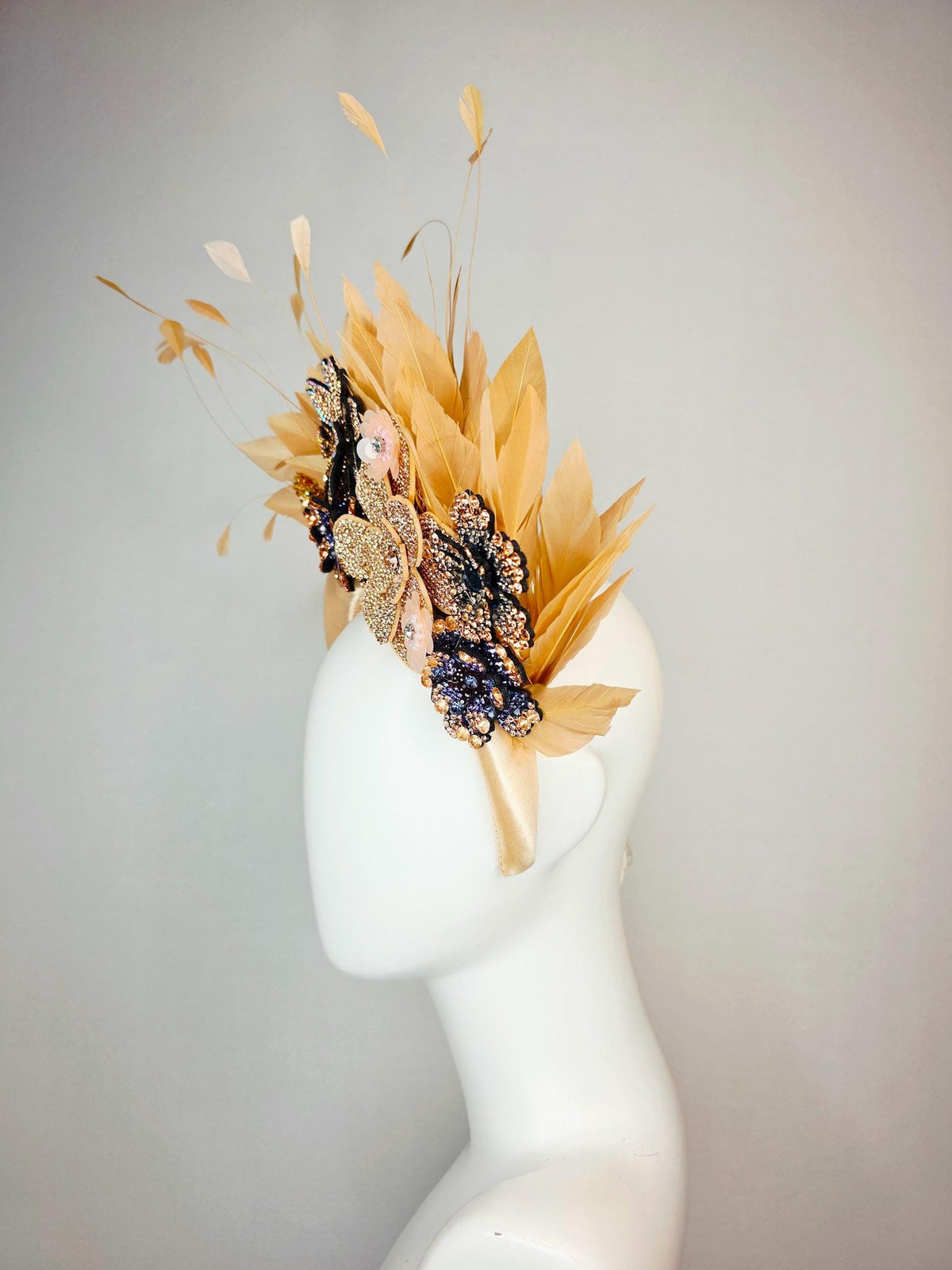 kentucky derby hat fascinator champagne gold satin headband with navy blue gold ivory crystal rhinestone flowers and tan beige gold feathers