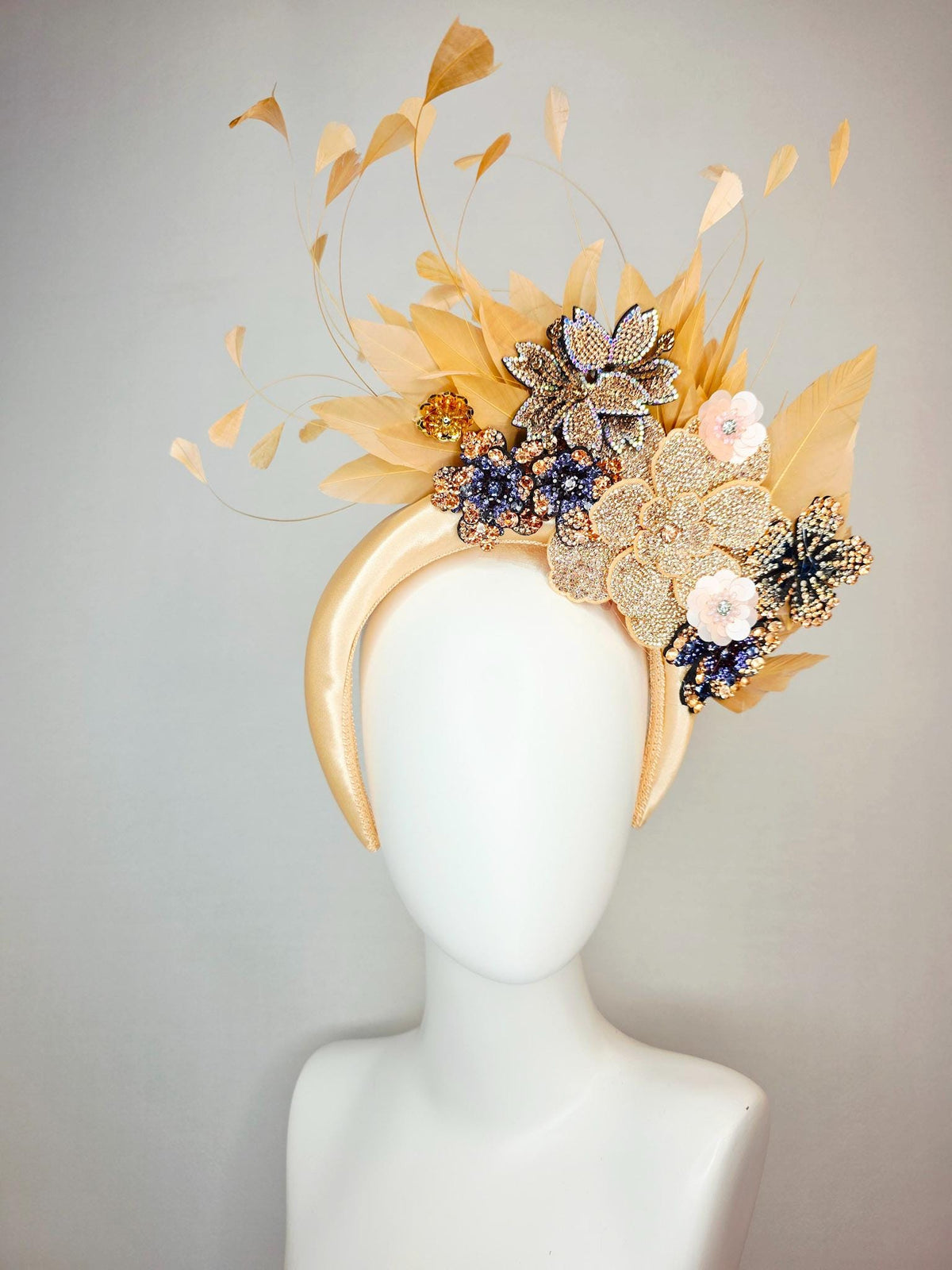 kentucky derby hat fascinator champagne gold satin headband with navy blue gold ivory crystal rhinestone flowers and tan beige gold feathers