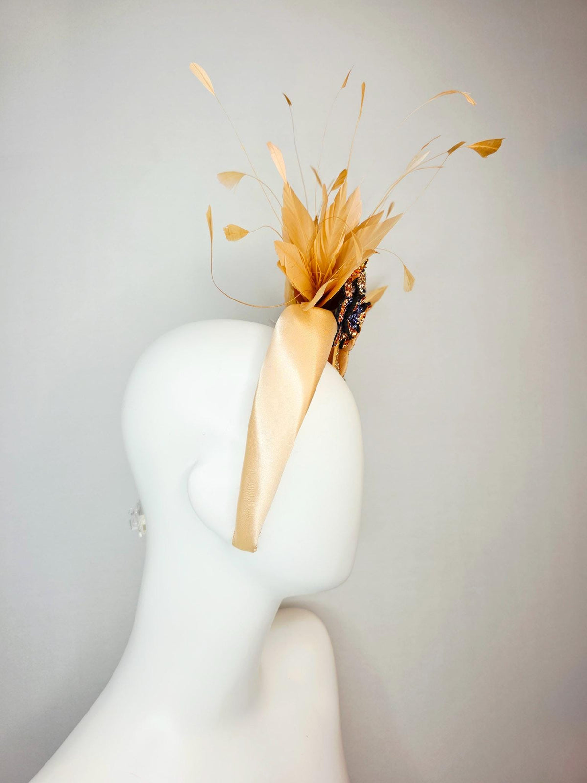 kentucky derby hat fascinator champagne gold satin headband with navy blue gold ivory crystal rhinestone flowers and tan beige gold feathers