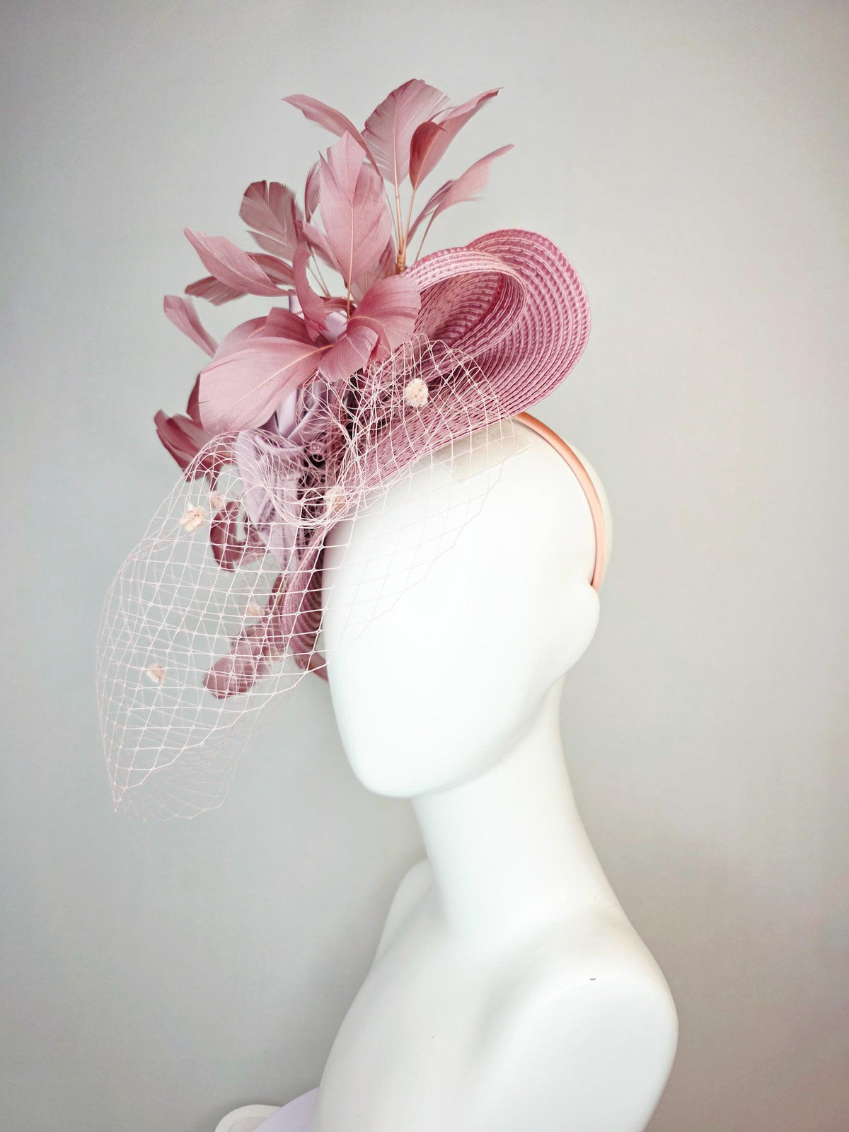 kentucky derby hat fascinator dusty mauve pink straw saucer with lilac pink satin bow dusty pink branching feathers light pink mesh veil