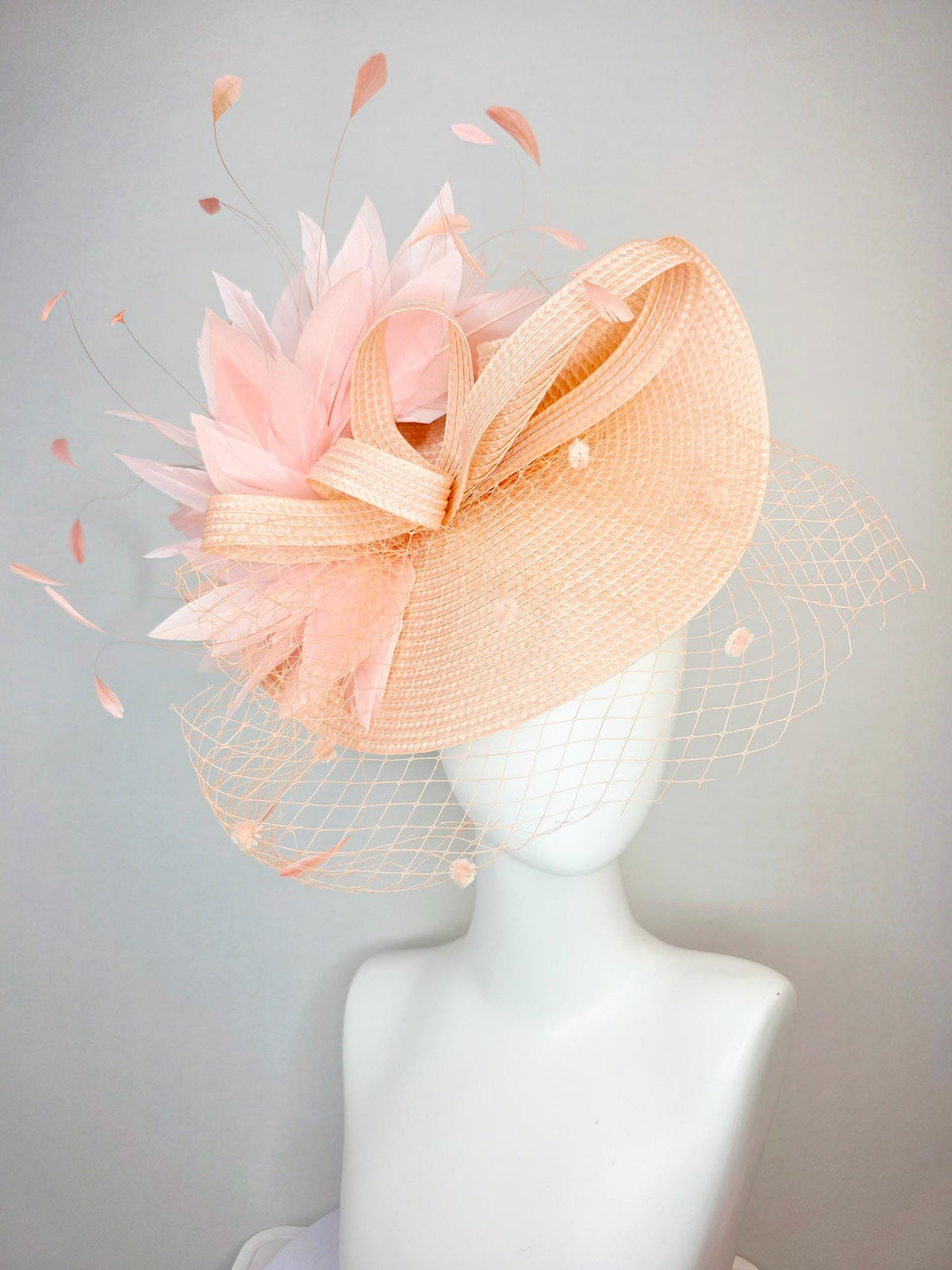 kentucky derby hat fascinator neutral champagne beige straw saucer with champagne straw bow light baby pink feathers and champagne mesh veil