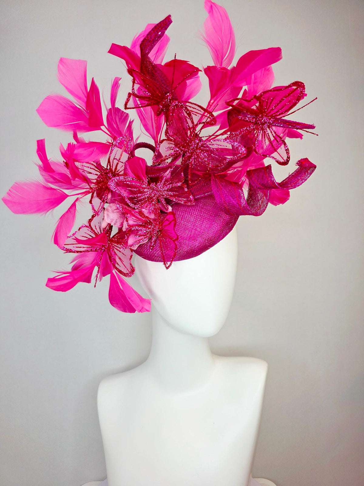kentucky derby hat fascinator magenta pink sinamay with curls pink ombre satin flowers fuchsia pink feathers hot pink glitter butterflies
