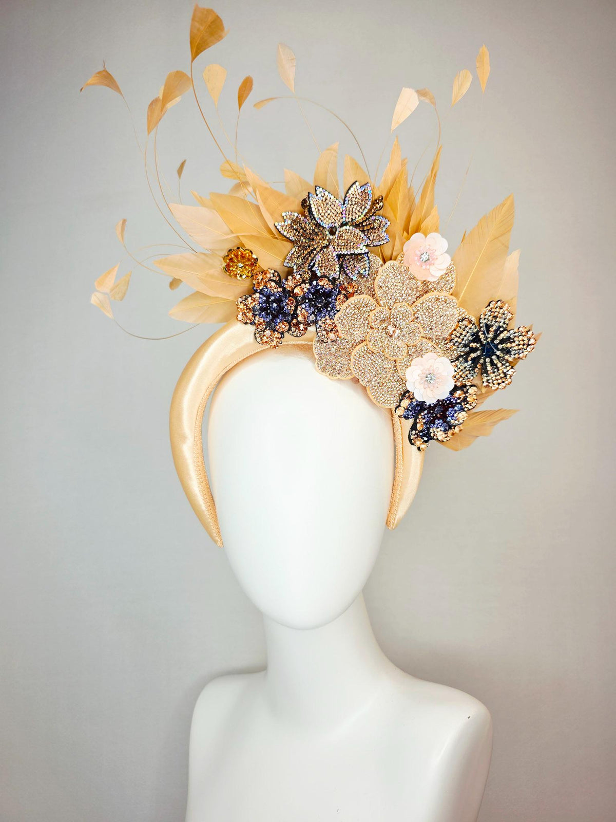 kentucky derby hat fascinator champagne gold satin headband with navy blue gold ivory crystal rhinestone flowers and tan beige gold feathers