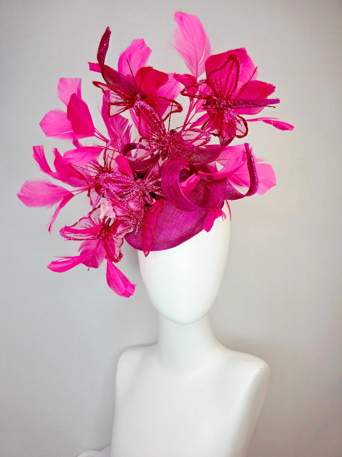 kentucky derby hat fascinator magenta pink sinamay with curls pink ombre satin flowers fuchsia pink feathers hot pink glitter butterflies