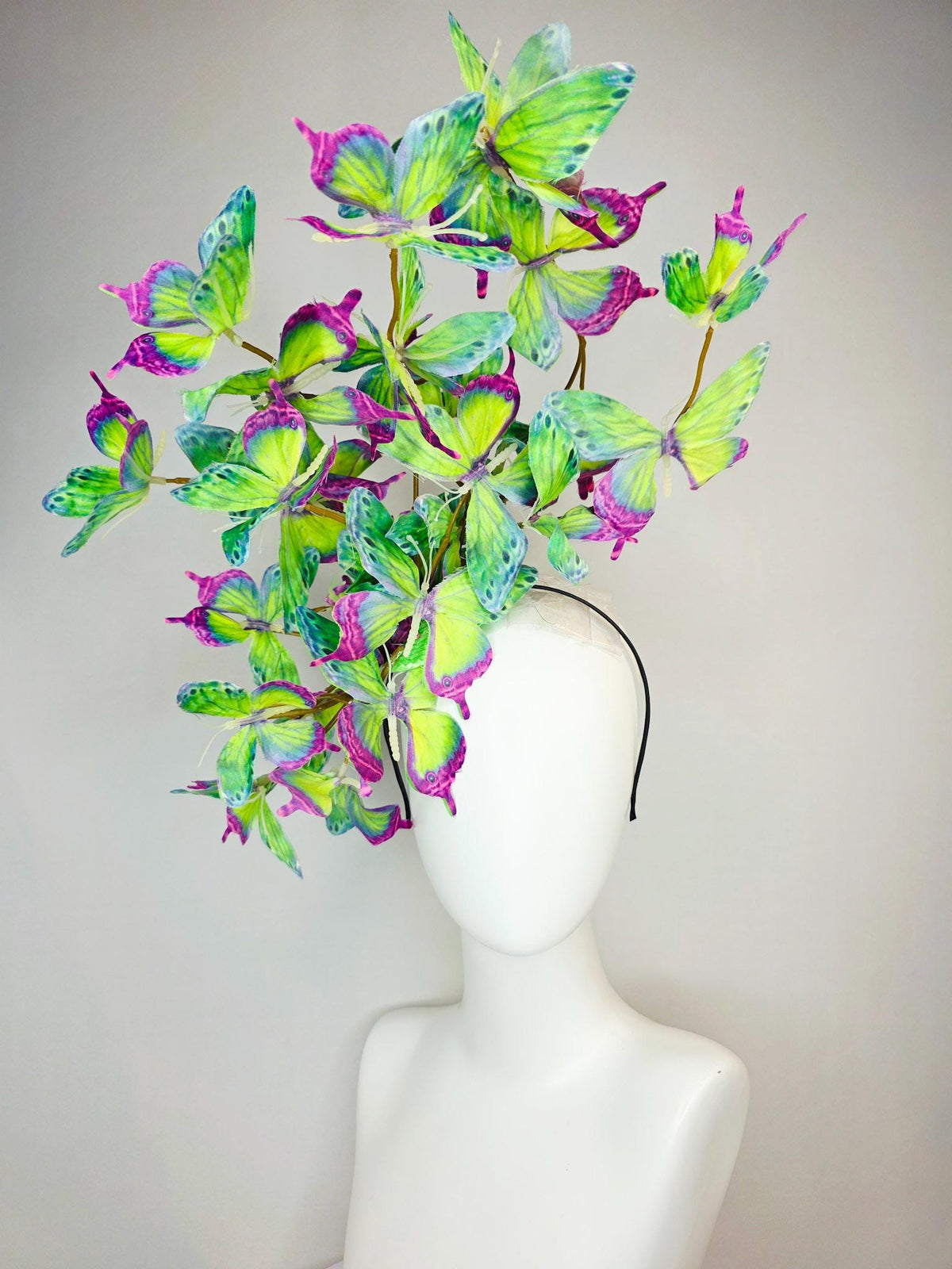 kentucky derby hat fascinator large branching colorful magenta pink purple lime green yellow blue fabric butterflies on headband