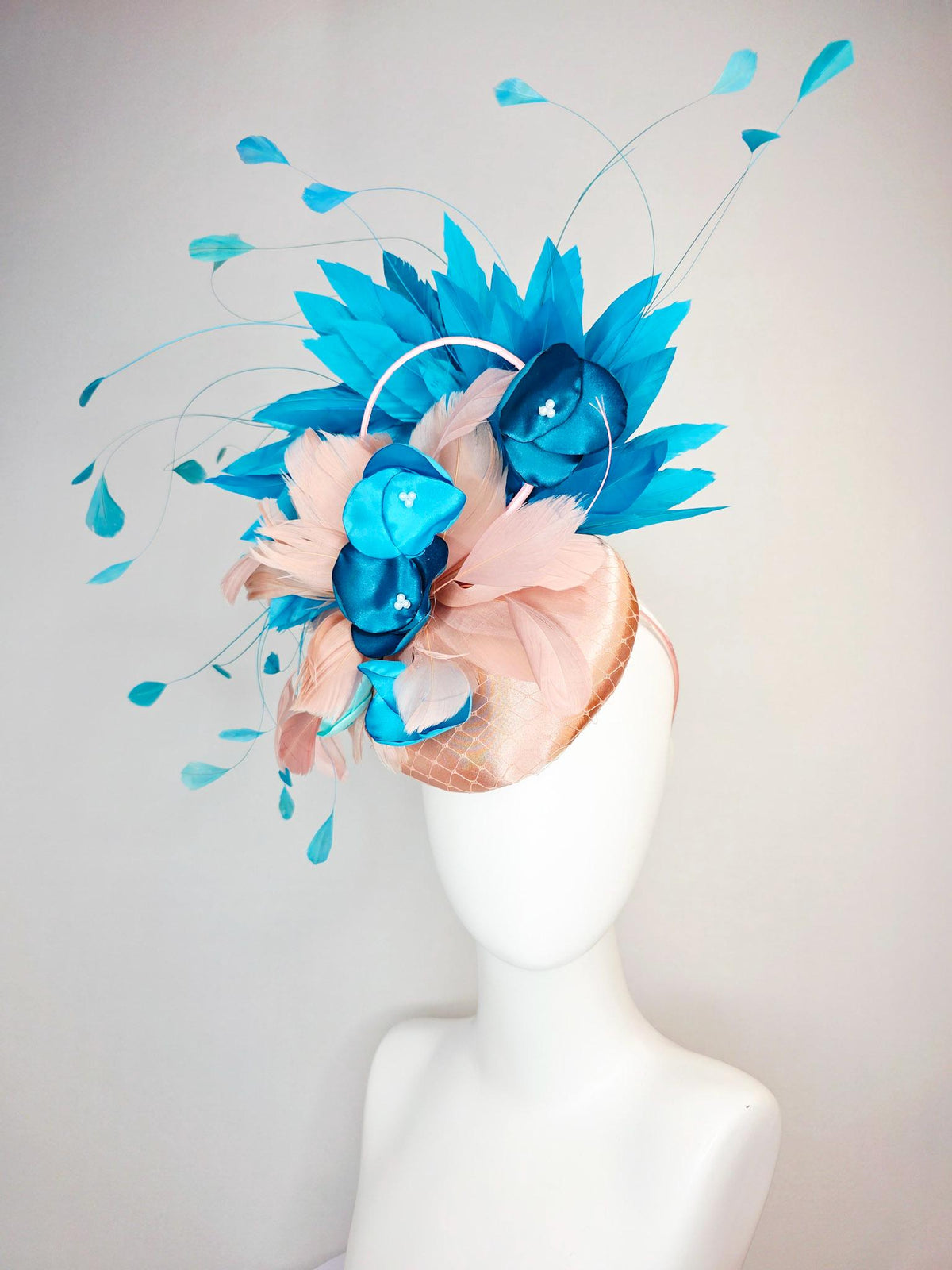 kentucky derby hat fascinator champagne beige satin with netting light dusty pink sky ocean blue feathers peacock turquoise satin flowers