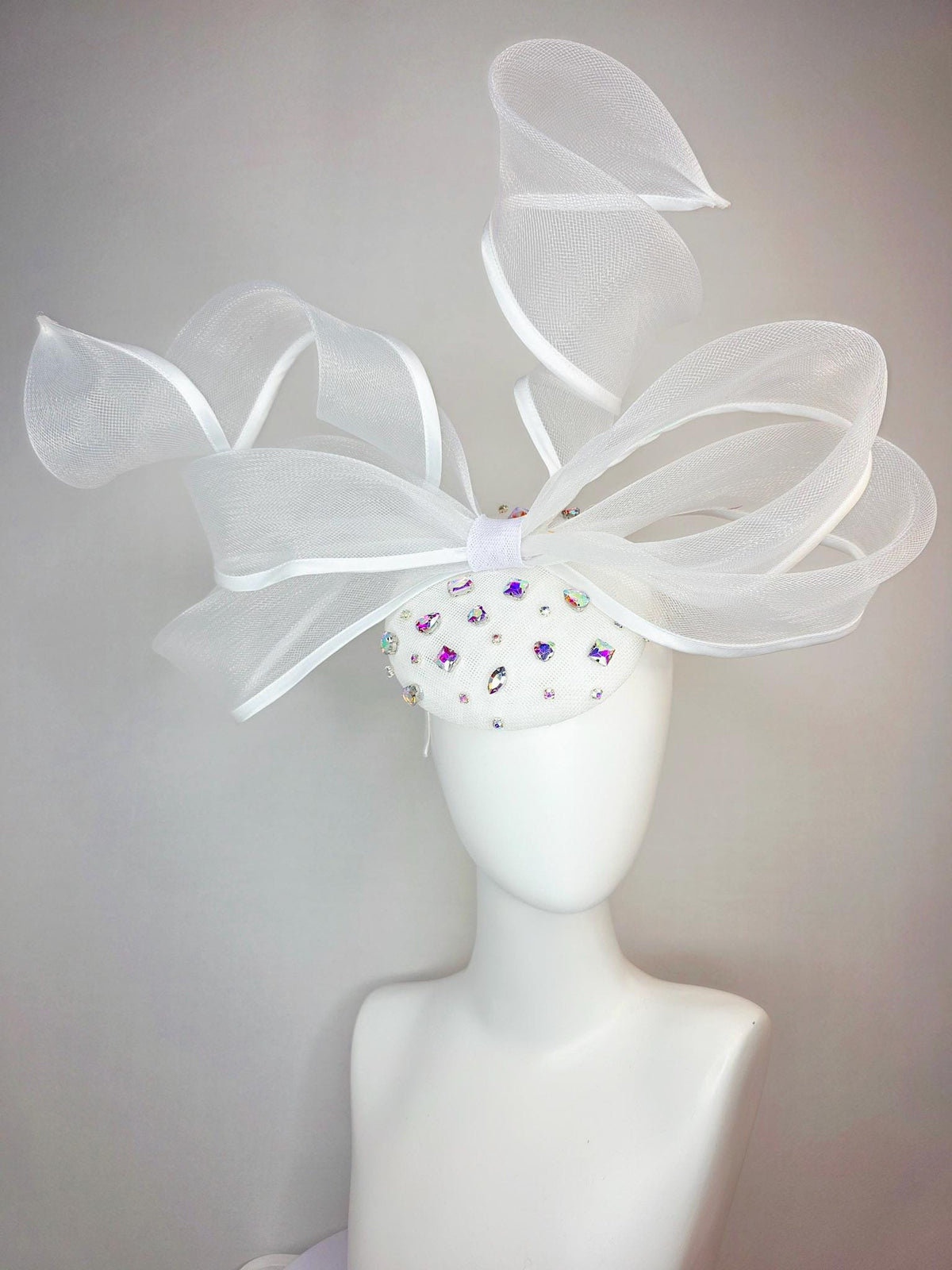kentucky derby hat fascinator white sinamay base with iridescent clear crystal jewels white mesh and wired ribbon large bendable bow decor