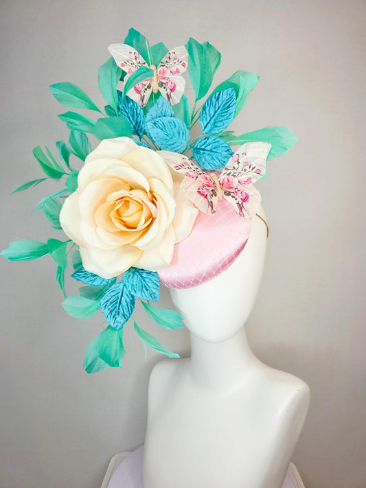 kentucky derby hat fascinator light pink satin with netting ivory cream satin rose turquoise blue leaves mint green feathers and butterflies