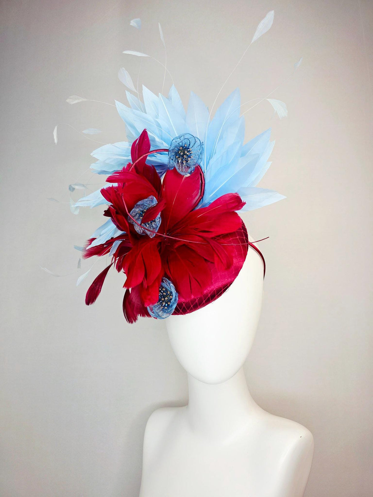 kentucky derby hat fascinator wine red satin with netting scarlet red sky blue branching feathers blue organza flowers rhinestone center