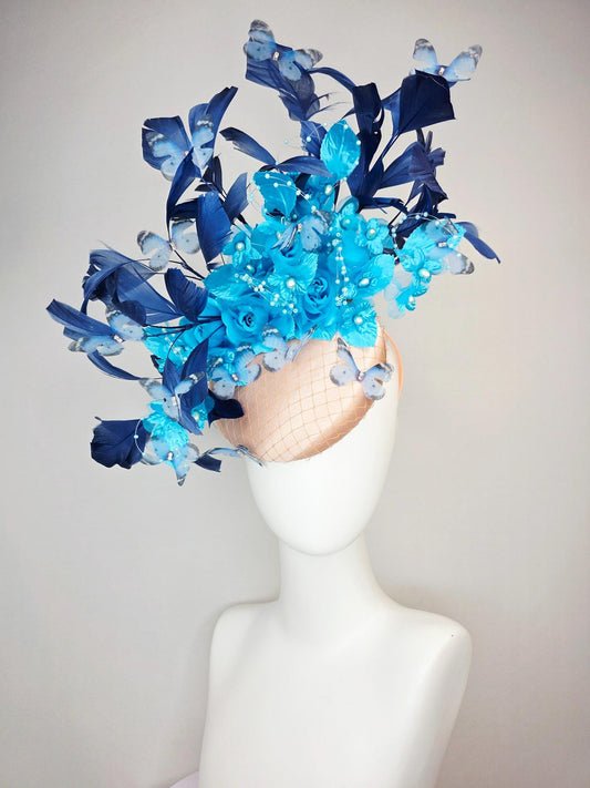 kentucky derby hat fascinator beige satin with netting ocean blue organza roses sky blue satin flowers navy blue feathers blue butterflies