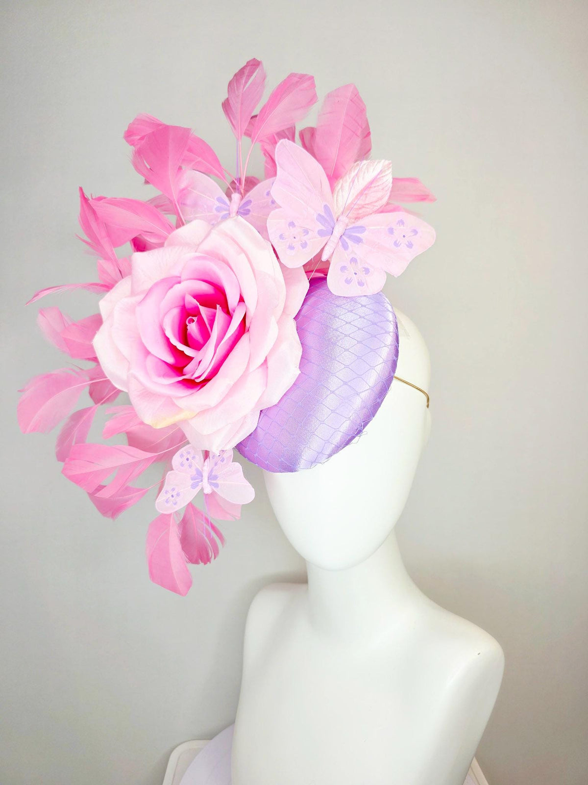 kentucky derby hat fascinator lavender purple satin with netting ombre pink satin rose light pink leaves blush pink feathers and butterflies