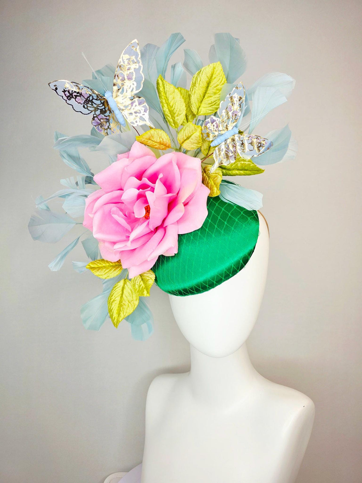 kentucky derby hat fascinator emerald green satin with netting blush pink satin rose lime yellow leaves gray blue feathers gold butterflies
