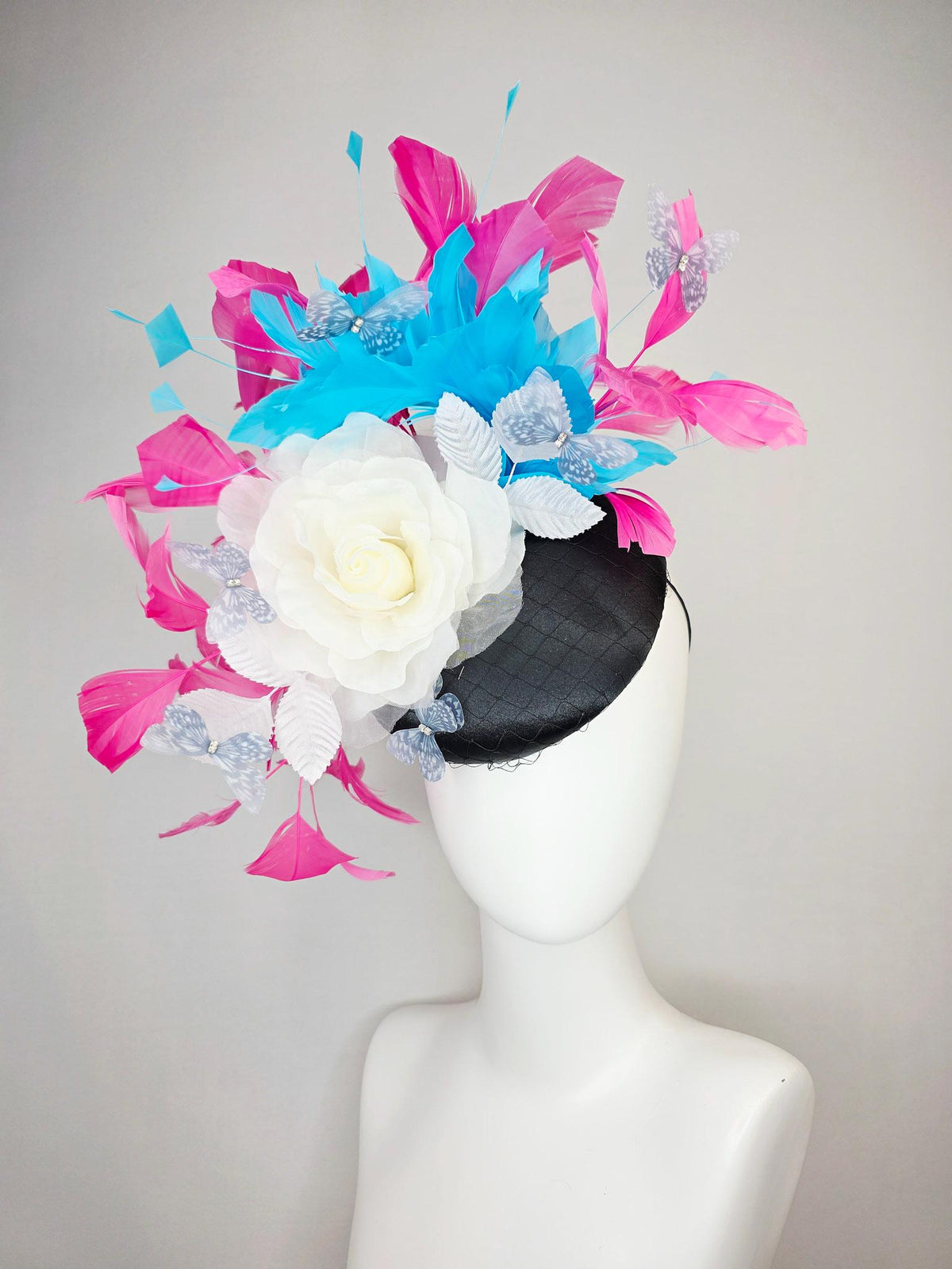 kentucky derby hat fascinator black satin with netting ivory white organza rose white leaves pink sky blue feathers light gray butterflies