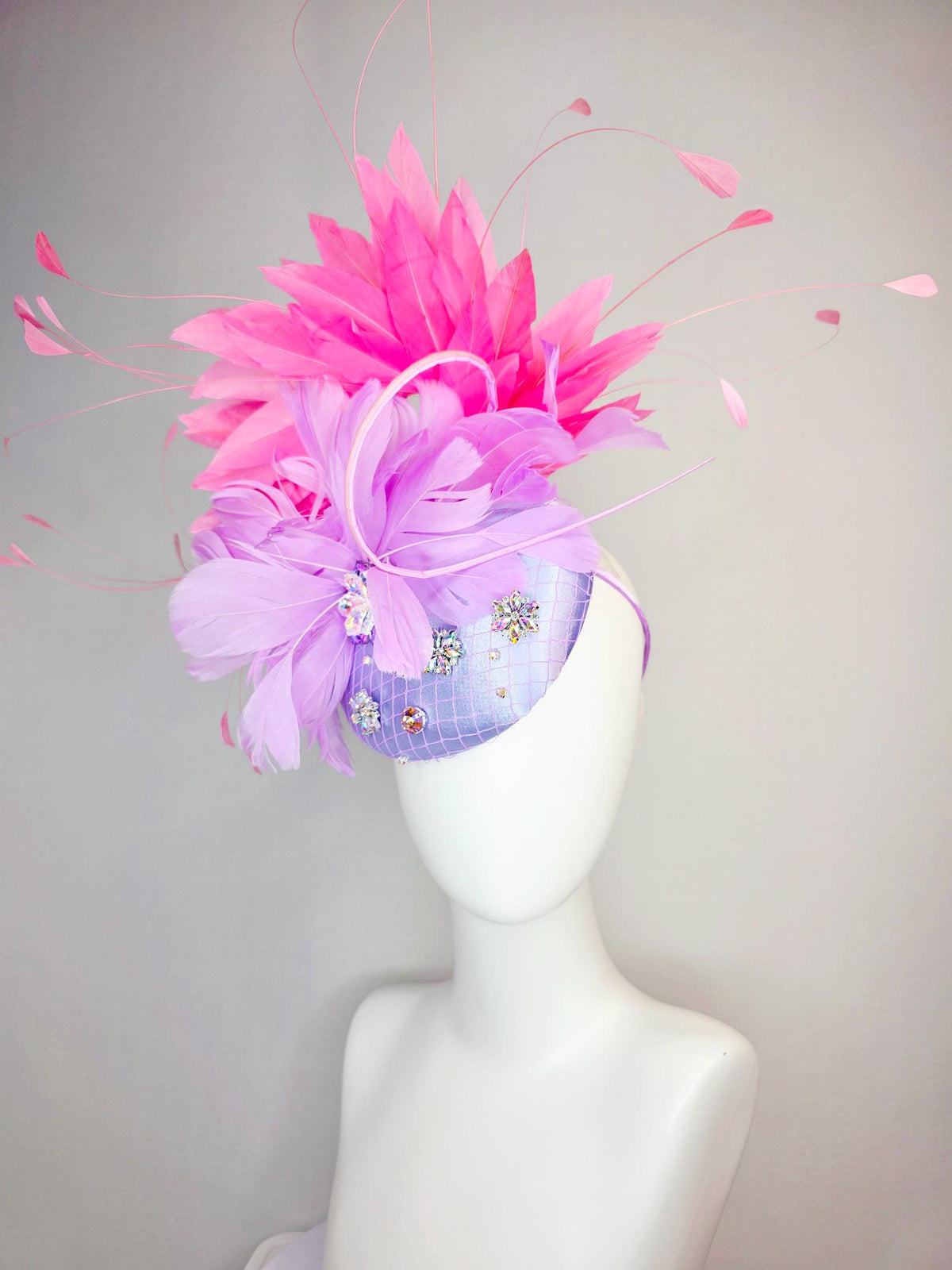 kentucky derby hat fascinator lavender purple satin with netting iridescent crystal rhinestone jewels lilac purple and pink fluffy feathers