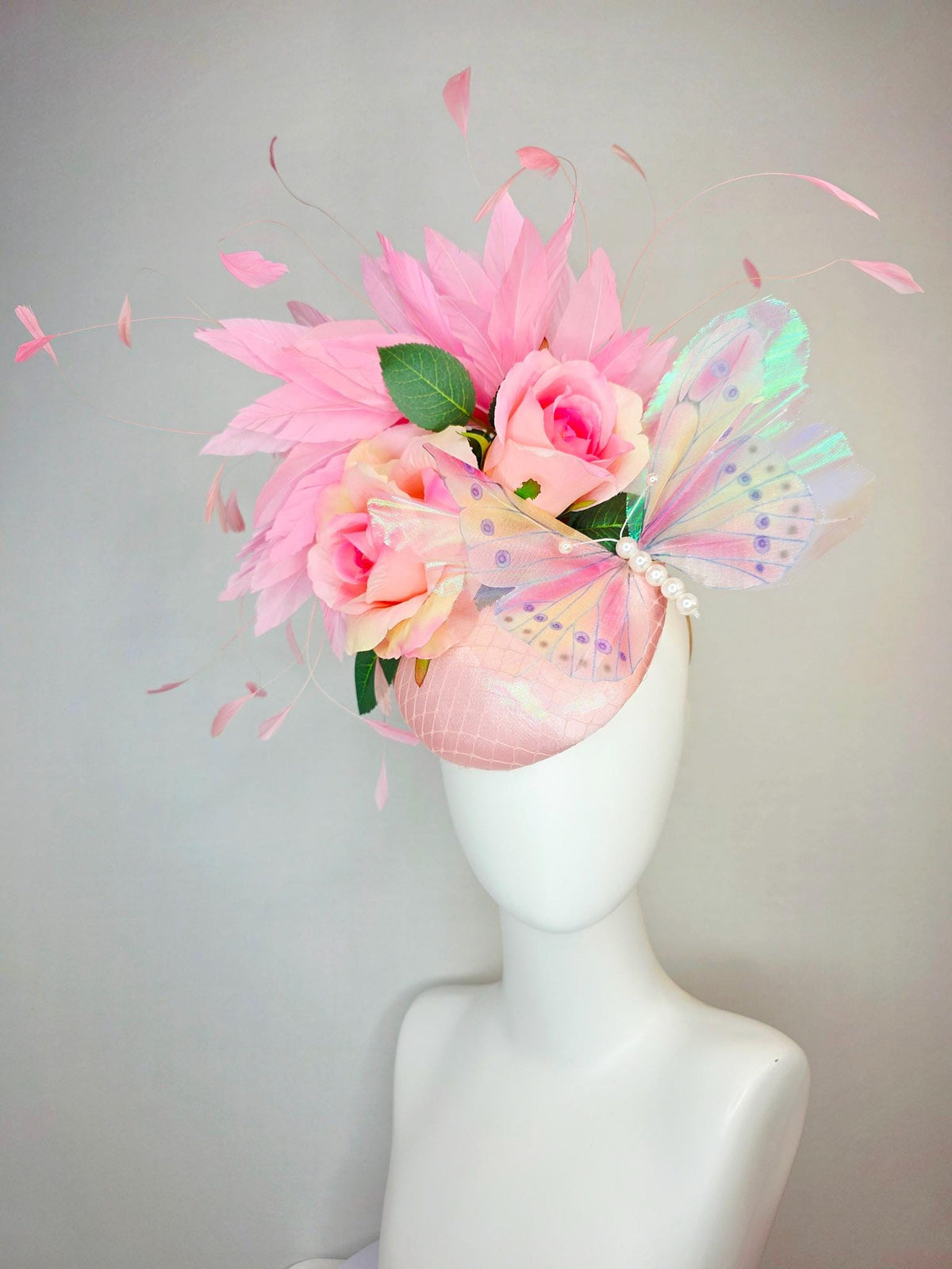 kentucky derby hat fascinator light pink satin with netting ombre pink satin roses green leaves baby blush pink feathers large butterfly