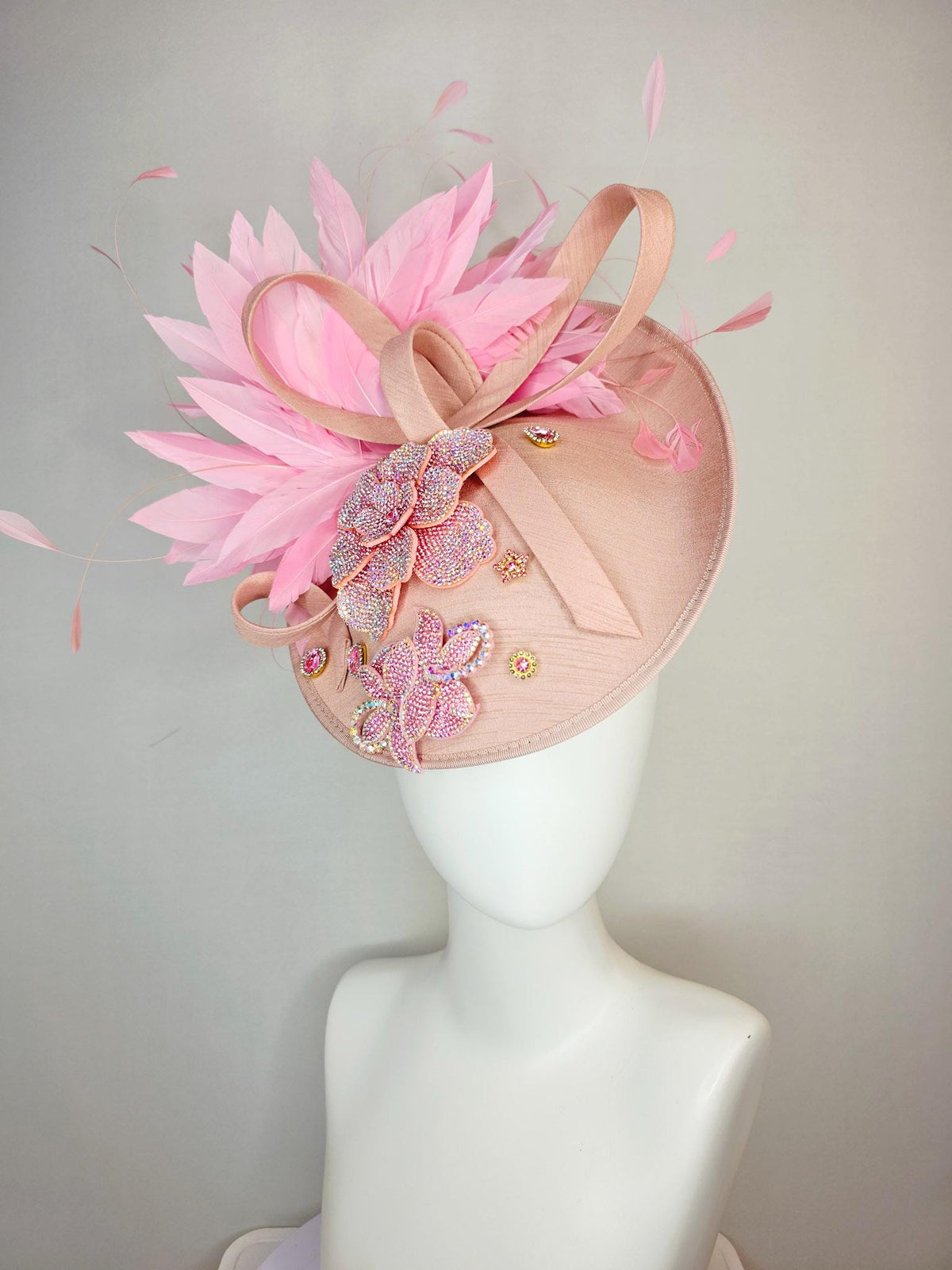 kentucky derby hat fascinator champagne pink shantung saucer with shantung bow iridescent pink crystal rhinestone flowers baby pink feathers