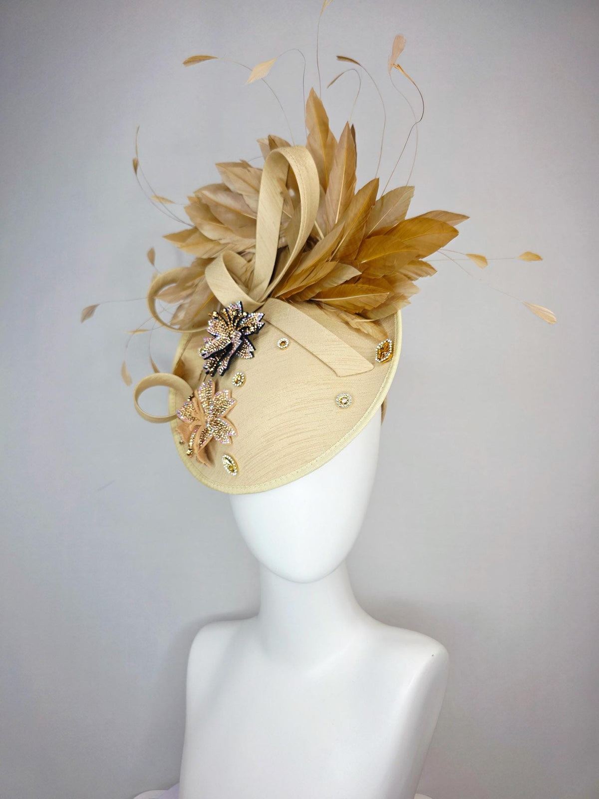 kentucky derby hat fascinator beige shantung saucer with shantung bow gold silver crystal rhinestone flowers tan beige gold feathers