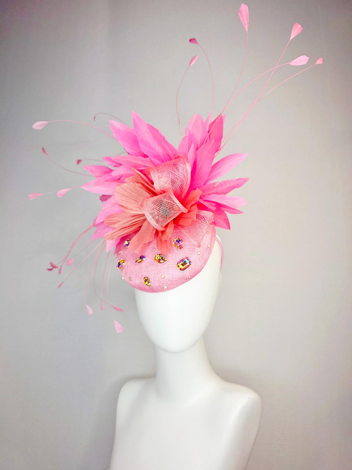 kentucky derby hat fascinator light pink sinamay iridescent pink crystal rhinestone jewels light pink bow peach orange blush pink feathers