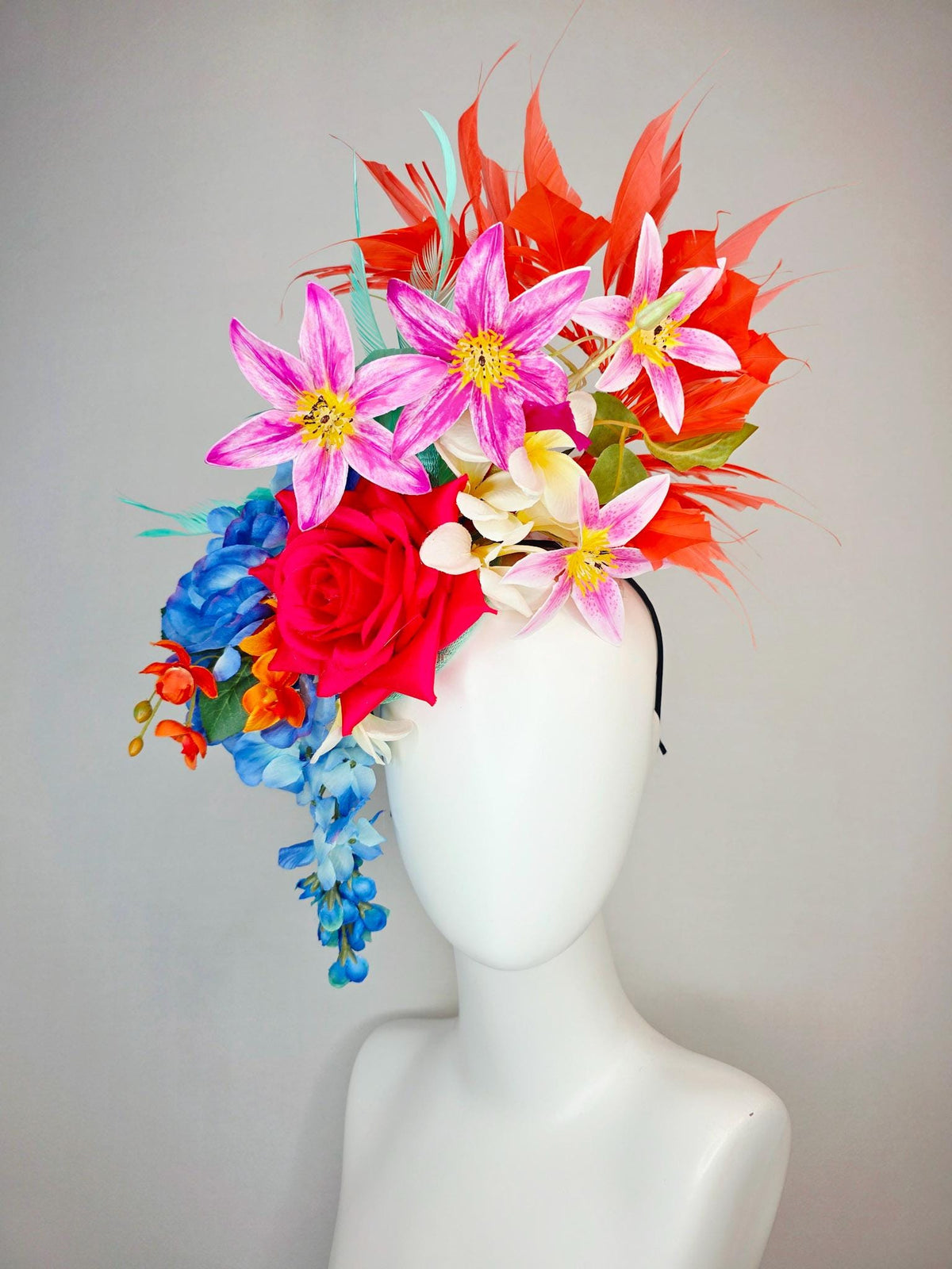 kentucky derby hat fascinator red satin rose orange ivory white pink blue satin flowers green leaves coral red and aqua mint green feathers