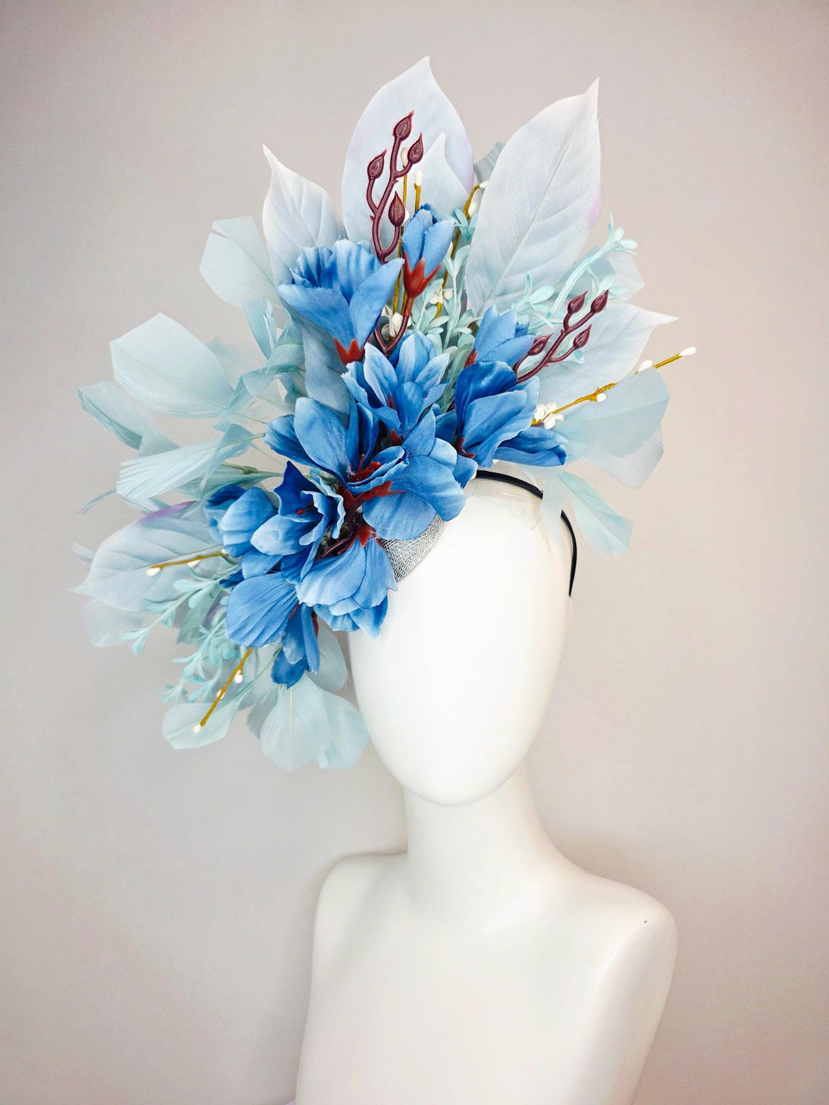 kentucky derby hat fascinator ombre royal blue satin flowers baby blue flower stems light blue satin leaves light blue branching feathers