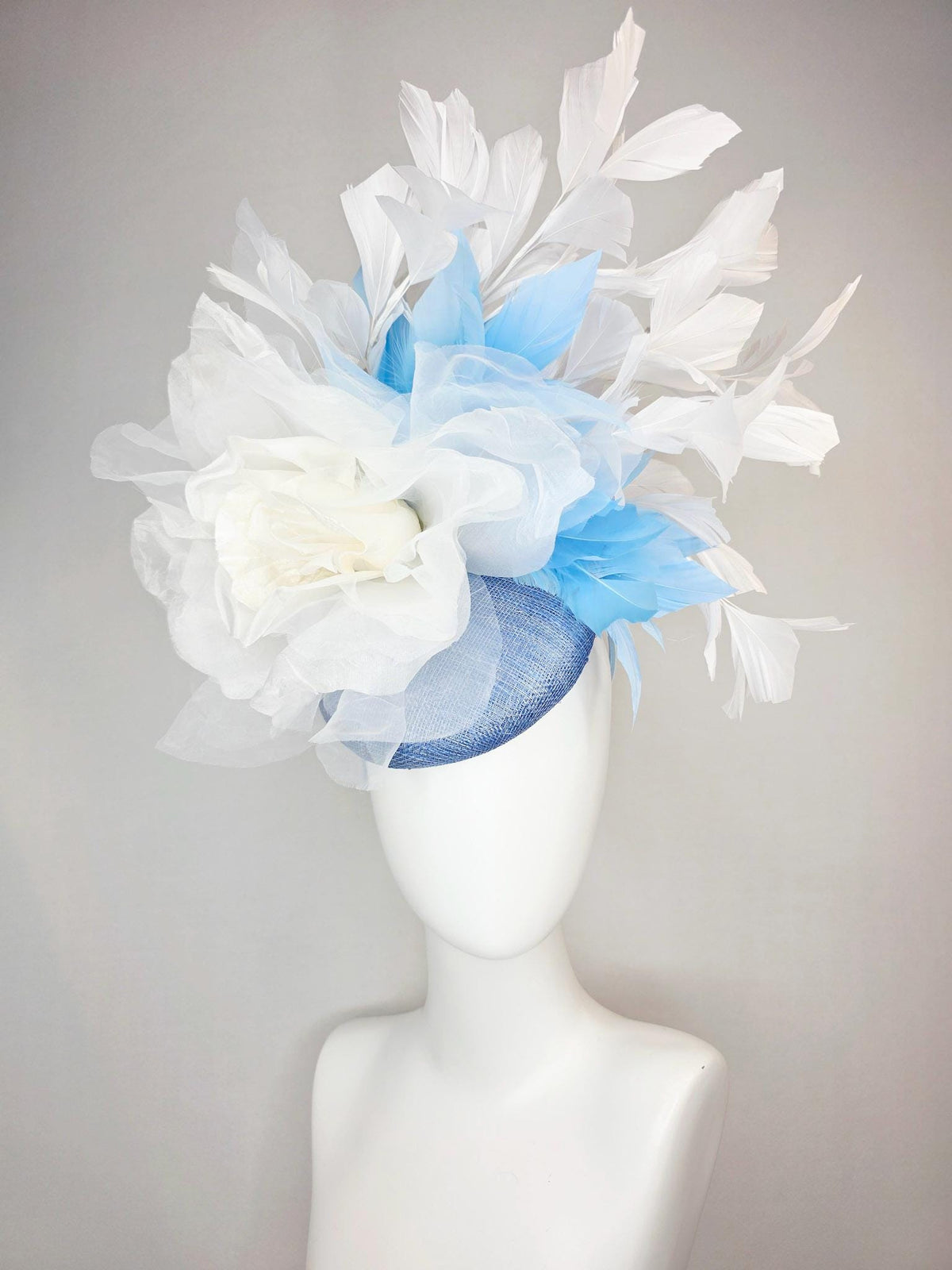 kentucky derby hat fascinator denim blue sinamay with large ivory white organza rose flower sky blue and white branching feathers