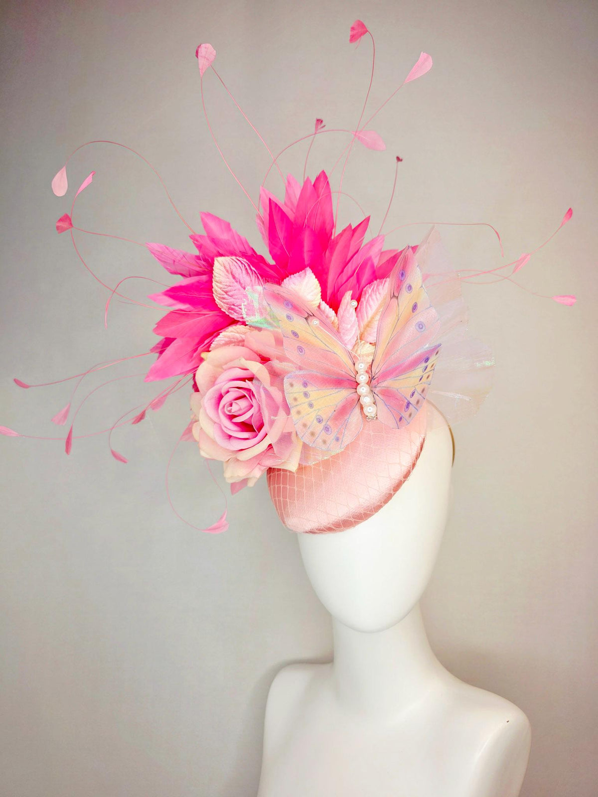 kentucky derby hat fascinator baby pink satin with netting ombre pink satin rose light pink leaves hot pink feathers and large butterfly