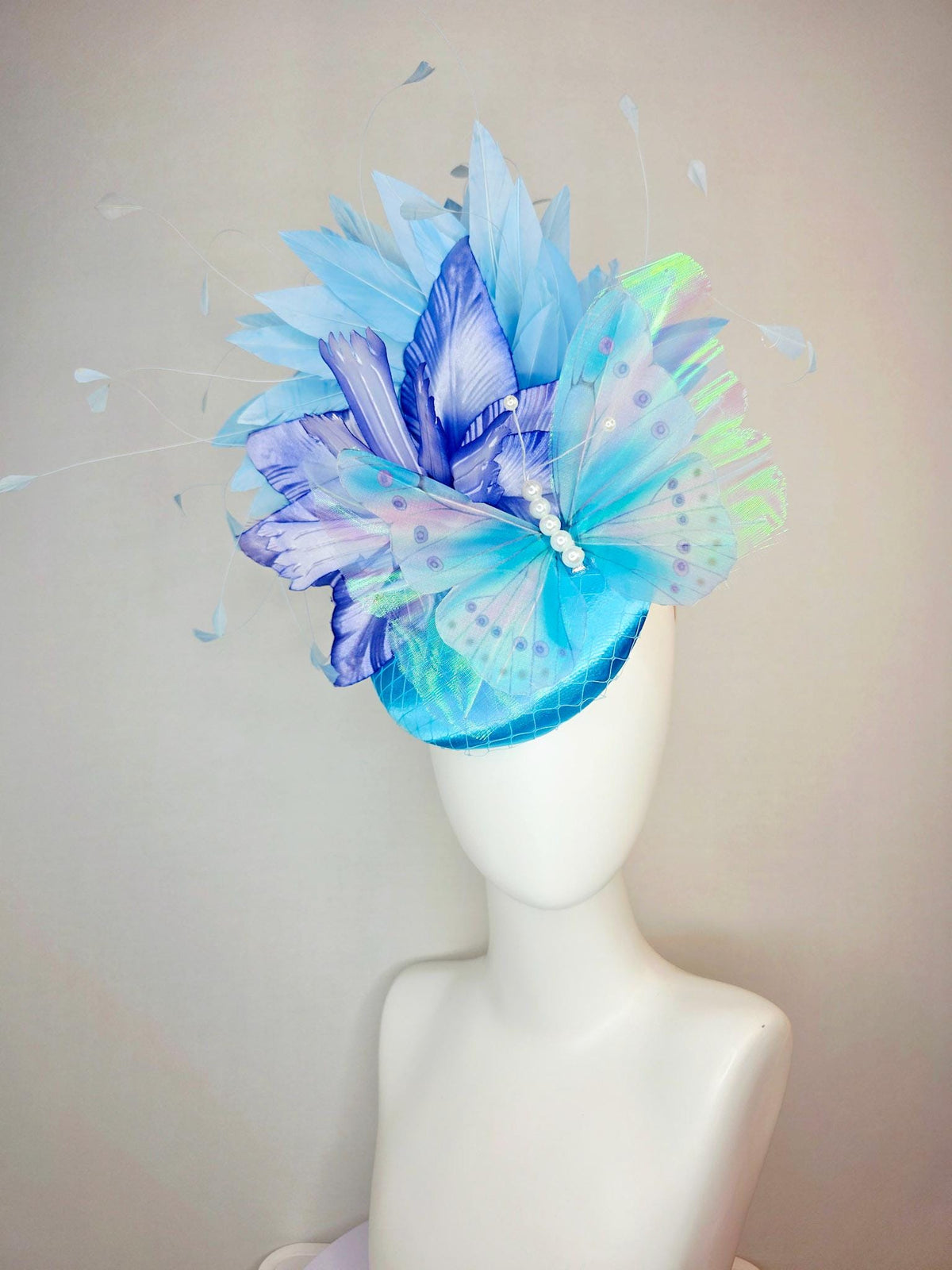 kentucky derby hat fascinator turquoise blue satin with netting ombre royal blue satin flower sky blue feathers large blue butterfly